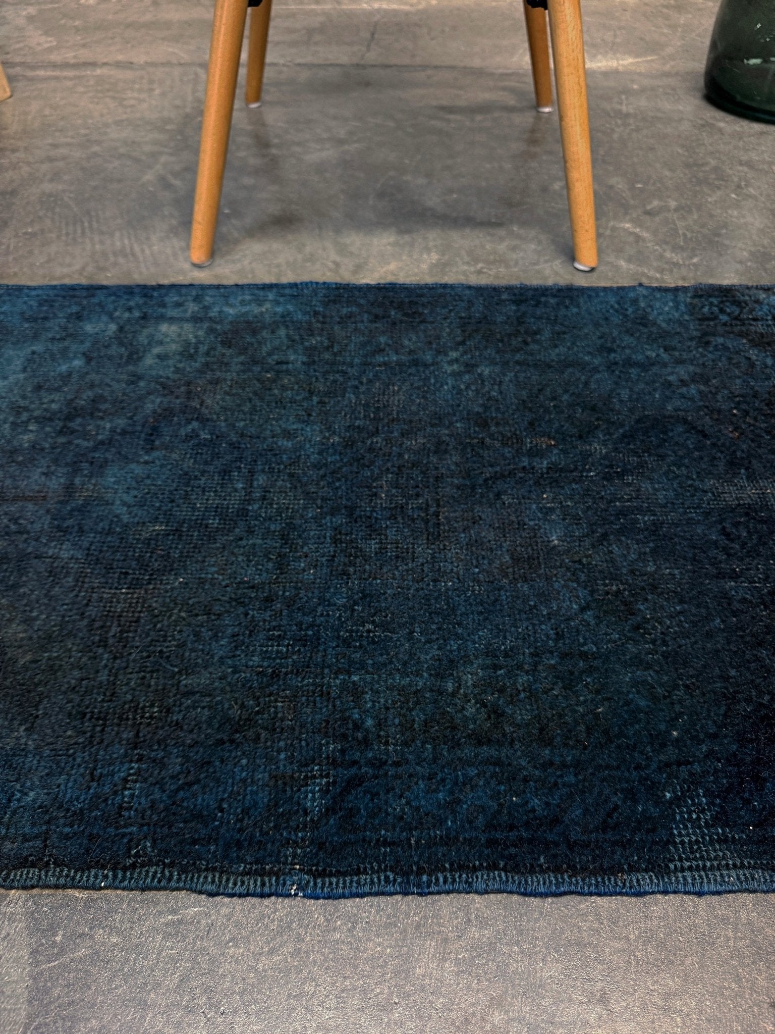 Midnight Blue Turkish overdyed Yastik rug with subtle shadowed motifs. Hand-knotted wool, 20x30 inches. Perfect for: Entryways & apartment foyers, beside the bed, kitchen sink areas, bathroom vanity spots, layered under décor pieces. One-of-a-kind rug from Indigo Rugs in Burlingame, the best rug shop in the San Francisco Bay Area. Free shipping included.