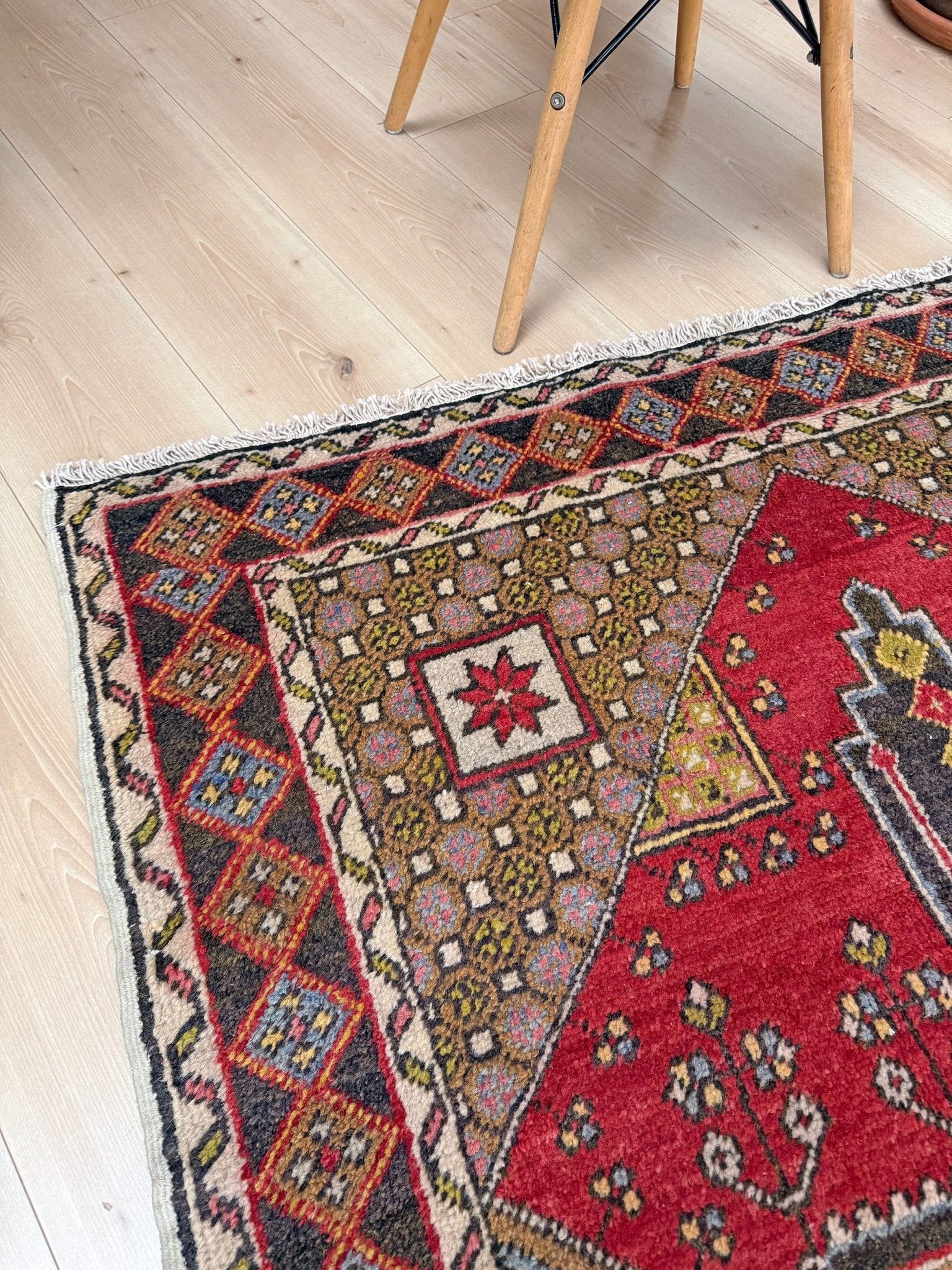 5x7 Vintage Turkish rug in rich crimson red with intricate medallion design, —perfect for bedroom, living room, or dining space. High-quality wool rug with vibrant hues of mustard yellow, olive green, and pale pink. Available at the best rug shop in San Mateo, SF Bay Area, with free shipping. Timeless character and craftsmanship for a stylish, cozy home.