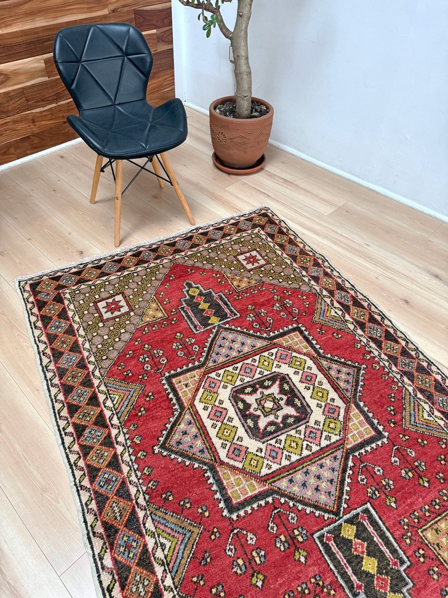 5x7 Vintage Turkish rug in rich crimson red with intricate medallion design, —perfect for bedroom, living room, or dining space. High-quality wool rug with vibrant hues of mustard yellow, olive green, and pale pink. Available at the best rug shop in San Mateo, SF Bay Area, with free shipping. Timeless character and craftsmanship for a stylish, cozy home.