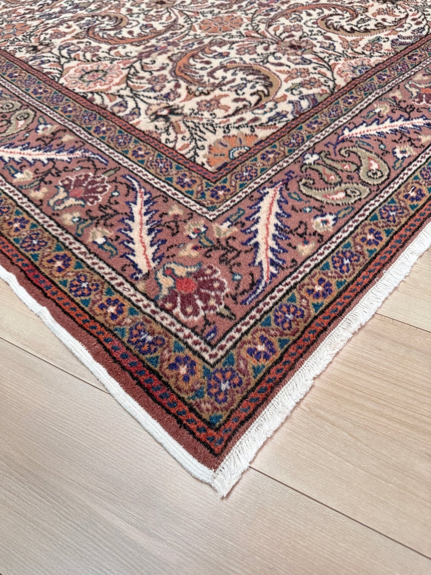 Vintage floral Kayseri handmade Turkish wool rug with an ivory field and scrolling botanical motifs in terracotta, soft rose, olive green, lavender, and ink blue. Size 5x7 ft. One-of-a-kind rug from Indigo Rugs in Burlingame, the best rug shop in the San Francisco Bay Area. Free shipping included.