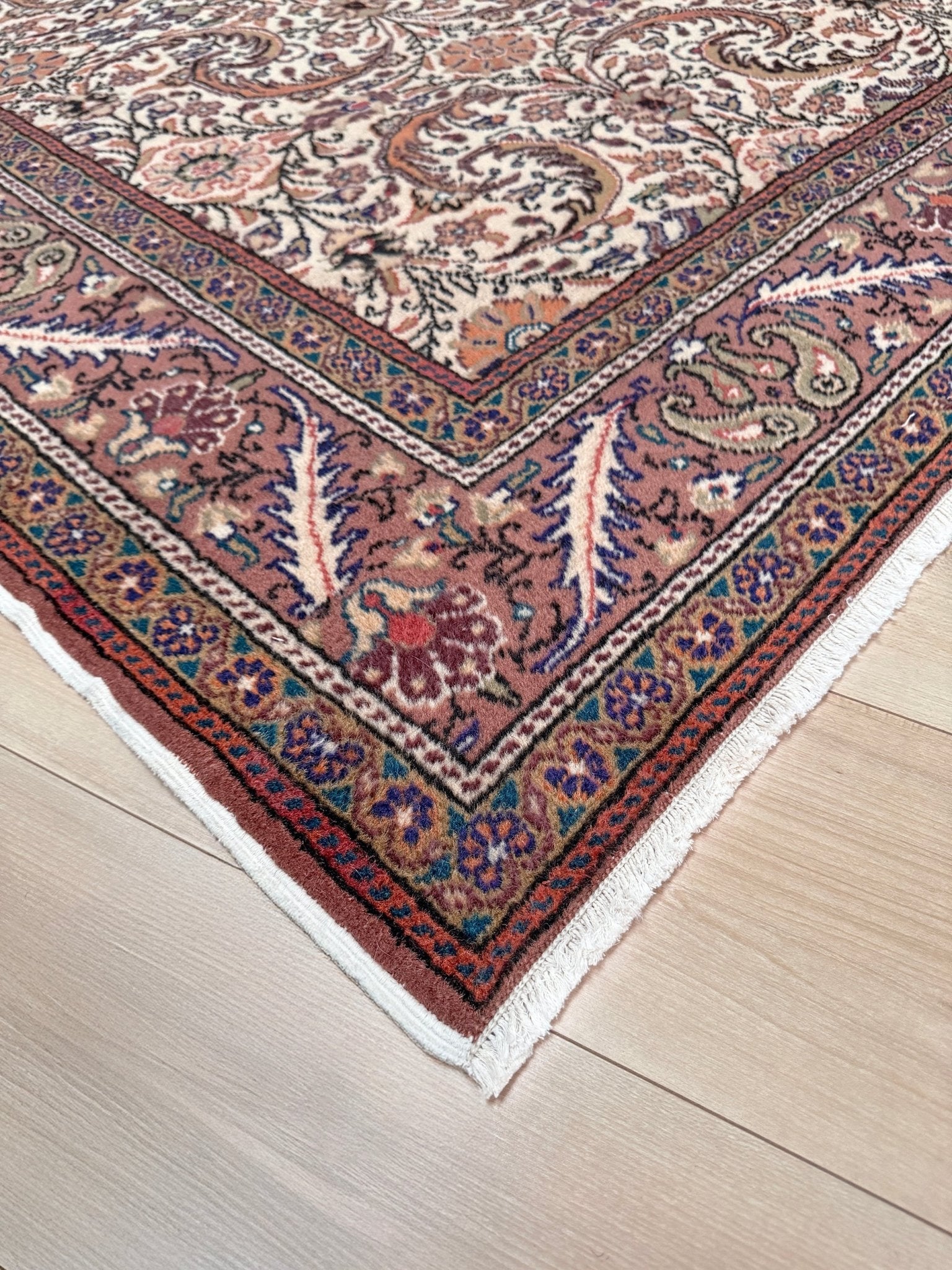 Vintage floral Kayseri handmade Turkish wool rug with an ivory field and scrolling botanical motifs in terracotta, soft rose, olive green, lavender, and ink blue. Size 5x7 ft. One-of-a-kind rug from Indigo Rugs in Burlingame, the best rug shop in the San Francisco Bay Area. Free shipping included.