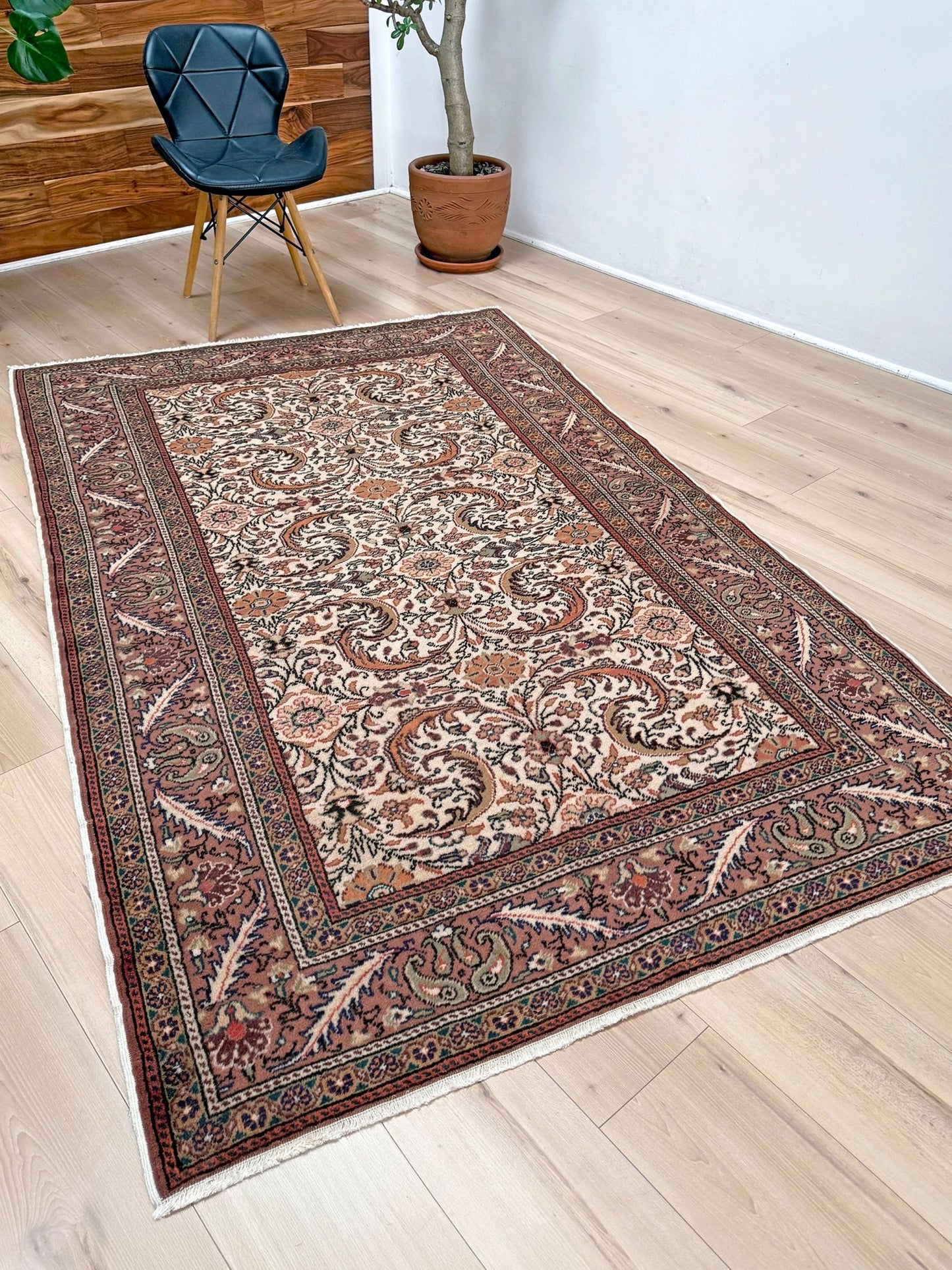 Vintage floral Kayseri handmade Turkish wool rug with an ivory field and scrolling botanical motifs in terracotta, soft rose, olive green, lavender, and ink blue. Size 5x7 ft. One-of-a-kind rug from Indigo Rugs in Burlingame, the best rug shop in the San Francisco Bay Area. Free shipping included.