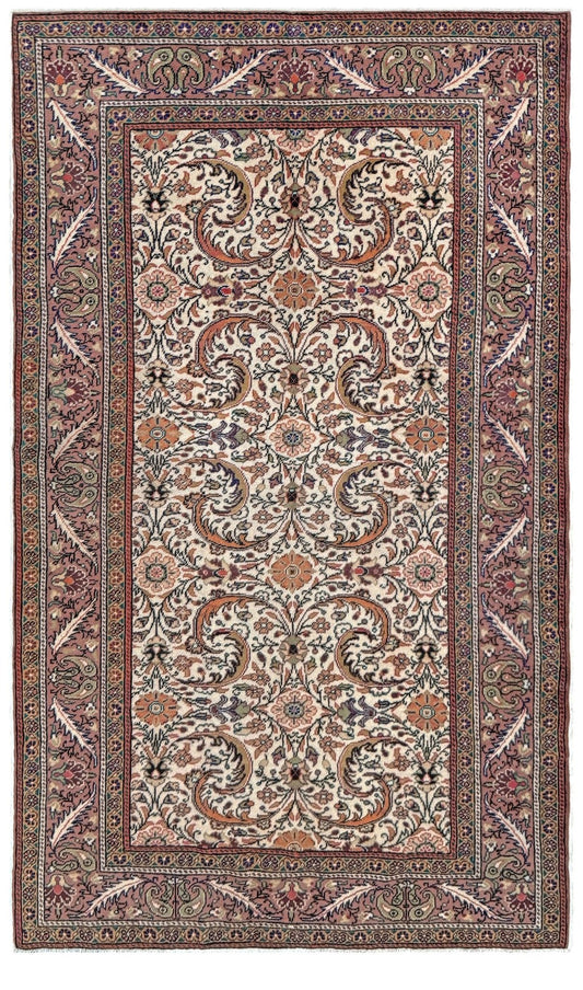 Vintage floral handmade Turkish wool rug with an ivory field and scrolling botanical motifs in terracotta, soft rose, olive green,  5x7 rug from Indigo Rugs in Burlingame, the best rug shop in the San Francisco Bay Area. Free shipping included.