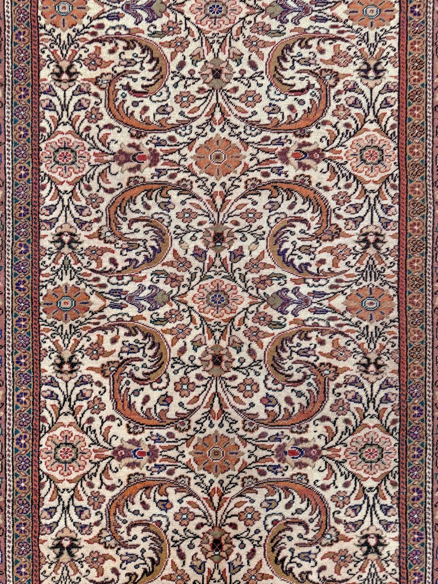 Vintage floral Kayseri handmade Turkish wool rug with an ivory field and scrolling botanical motifs in terracotta, soft rose, olive green, lavender, and ink blue. Size 5x7 ft. One-of-a-kind rug from Indigo Rugs in Burlingame, the best rug shop in the San Francisco Bay Area. Free shipping included.