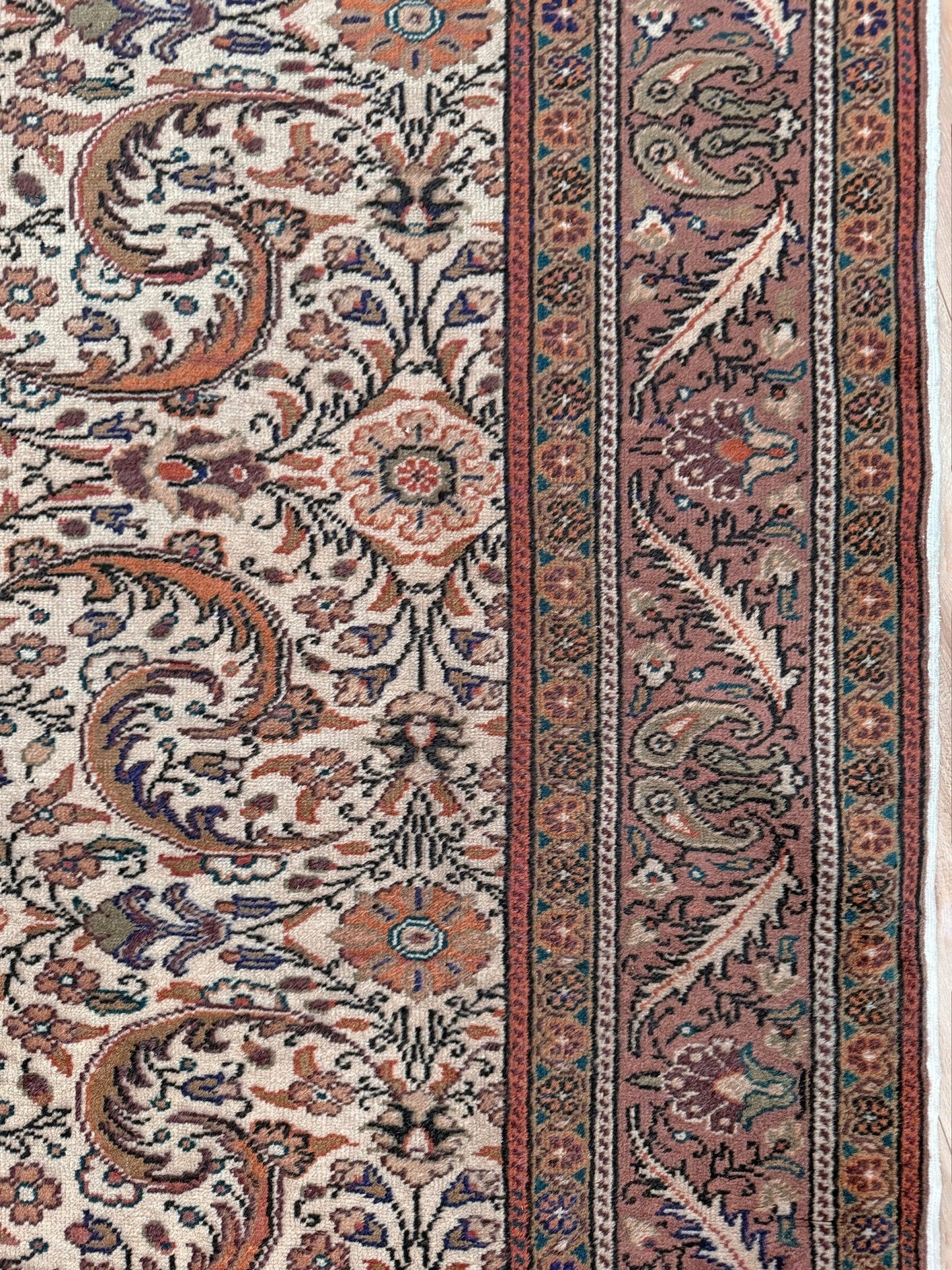 Vintage floral Kayseri handmade Turkish wool rug with an ivory field and scrolling botanical motifs in terracotta, soft rose, olive green, lavender, and ink blue. Size 5x7 ft. One-of-a-kind rug from Indigo Rugs in Burlingame, the best rug shop in the San Francisco Bay Area. Free shipping included.