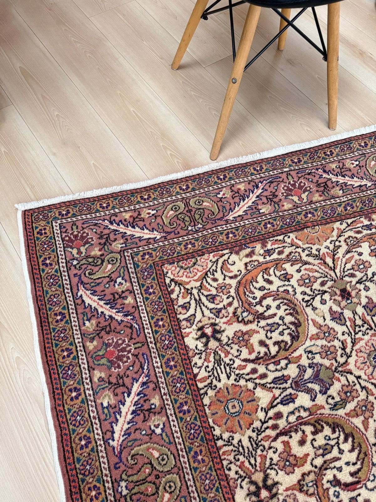 Vintage floral handmade Turkish wool rug with an ivory field and scrolling botanical motifs in terracotta, soft rose, olive green,  5x7 rug from Indigo Rugs in Burlingame, the best rug shop in the San Francisco Bay Area. Free shipping included.