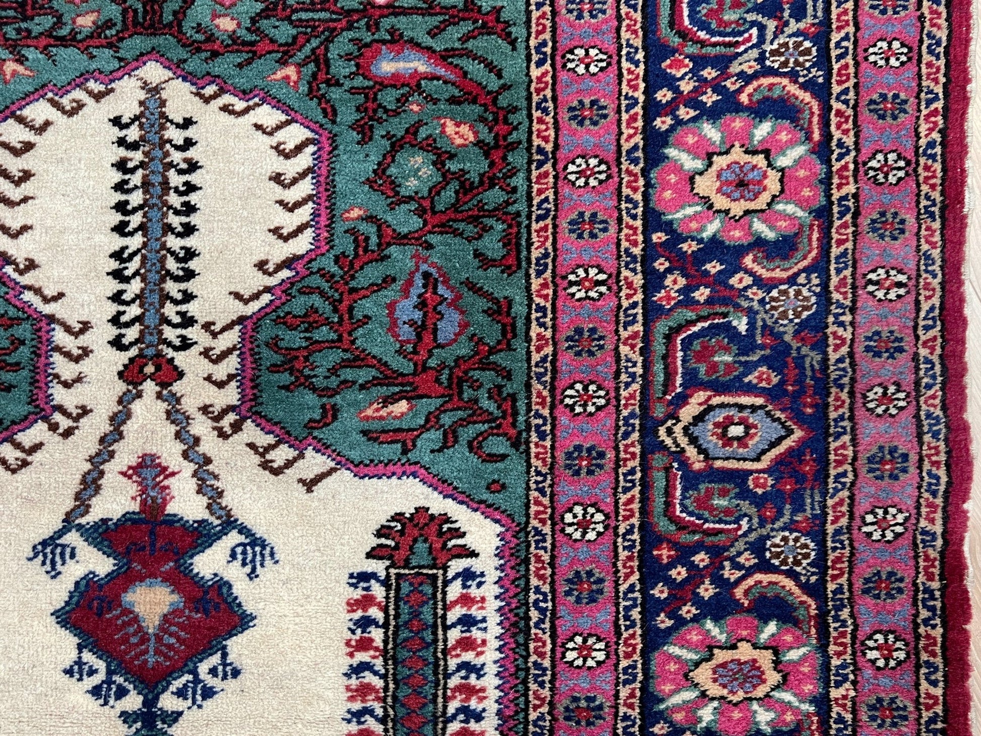 3x5 Turkish Kayseri scatter rug with prayer design, featuring a white ground, tulip pink and and a candle motif in the niche. Colors include baby blue, teal, and brown. Handmade from top-quality handspun Turkish wool, vibrant. Available at the best prices in the San Francisco Bay Area at Indigo Rugs, specializing in all handmade rugs.