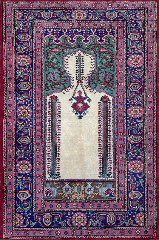 3x5 Turkish Kayseri scatter rug with prayer design, featuring a white ground, tulip pink and and a candle motif in the niche. Colors include baby blue, teal, and brown. Handmade from top-quality handspun Turkish wool, vibrant. Available at the best prices in the San Francisco Bay Area at Indigo Rugs, specializing in all handmade rugs.