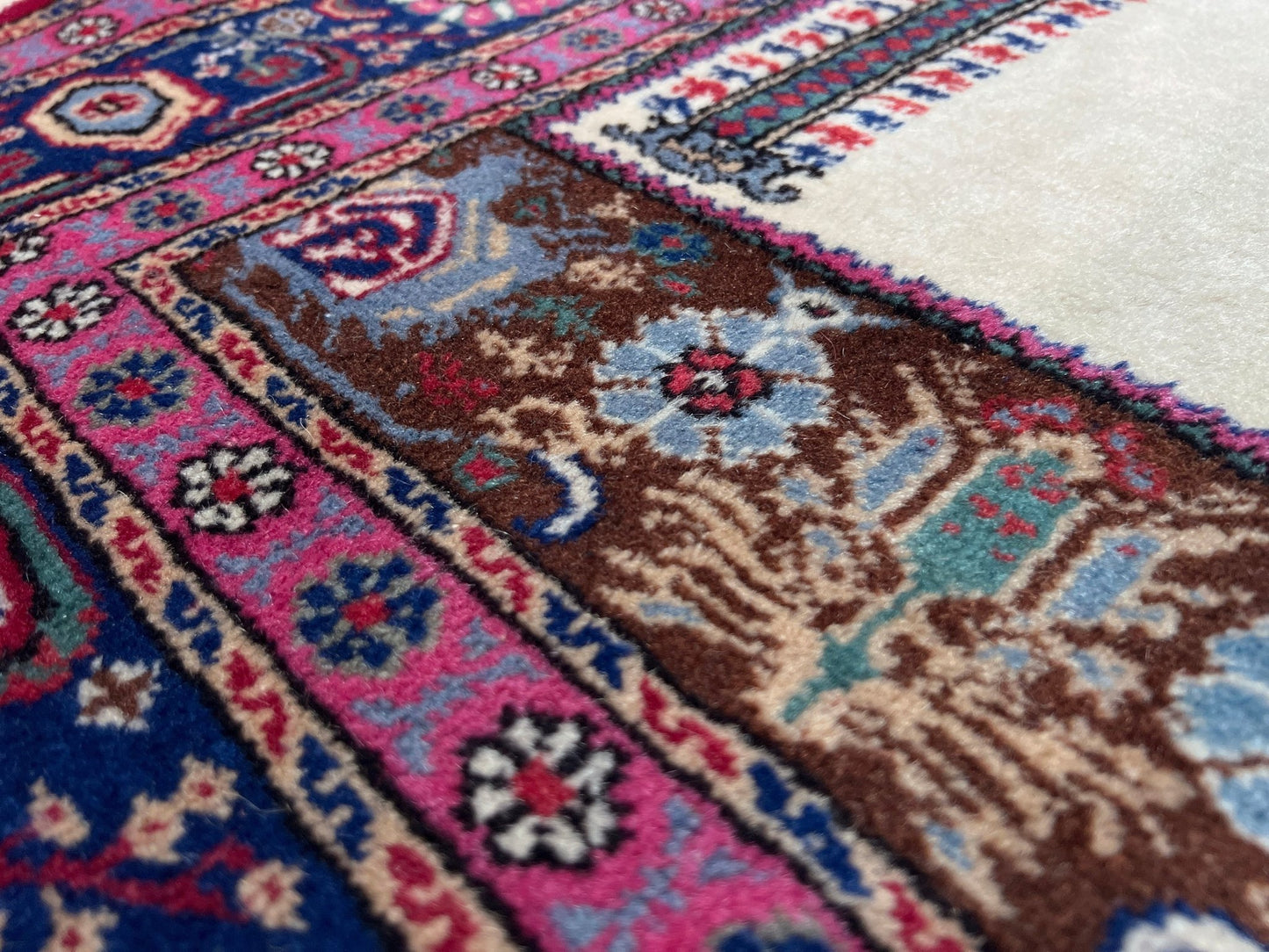 3x5 Turkish Kayseri scatter rug with prayer design, featuring a white ground, tulip pink and and a candle motif in the niche. Colors include baby blue, teal, and brown. Handmade from top-quality handspun Turkish wool, vibrant. Available at the best prices in the San Francisco Bay Area at Indigo Rugs, specializing in all handmade rugs.