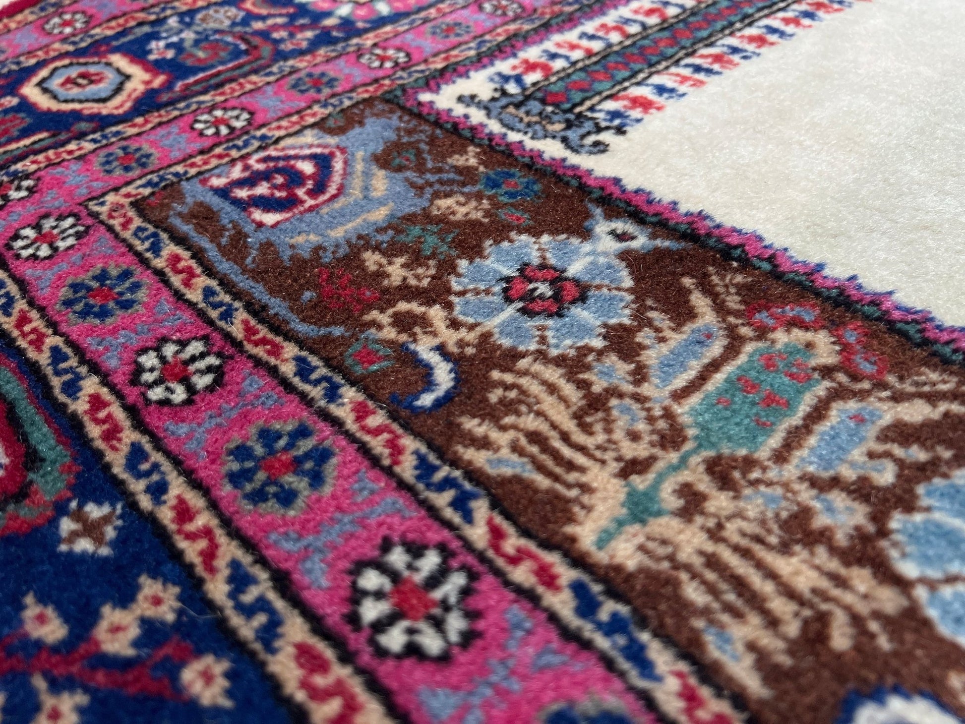 3x5 Turkish Kayseri scatter rug with prayer design, featuring a white ground, tulip pink and and a candle motif in the niche. Colors include baby blue, teal, and brown. Handmade from top-quality handspun Turkish wool, vibrant. Available at the best prices in the San Francisco Bay Area at Indigo Rugs, specializing in all handmade rugs.