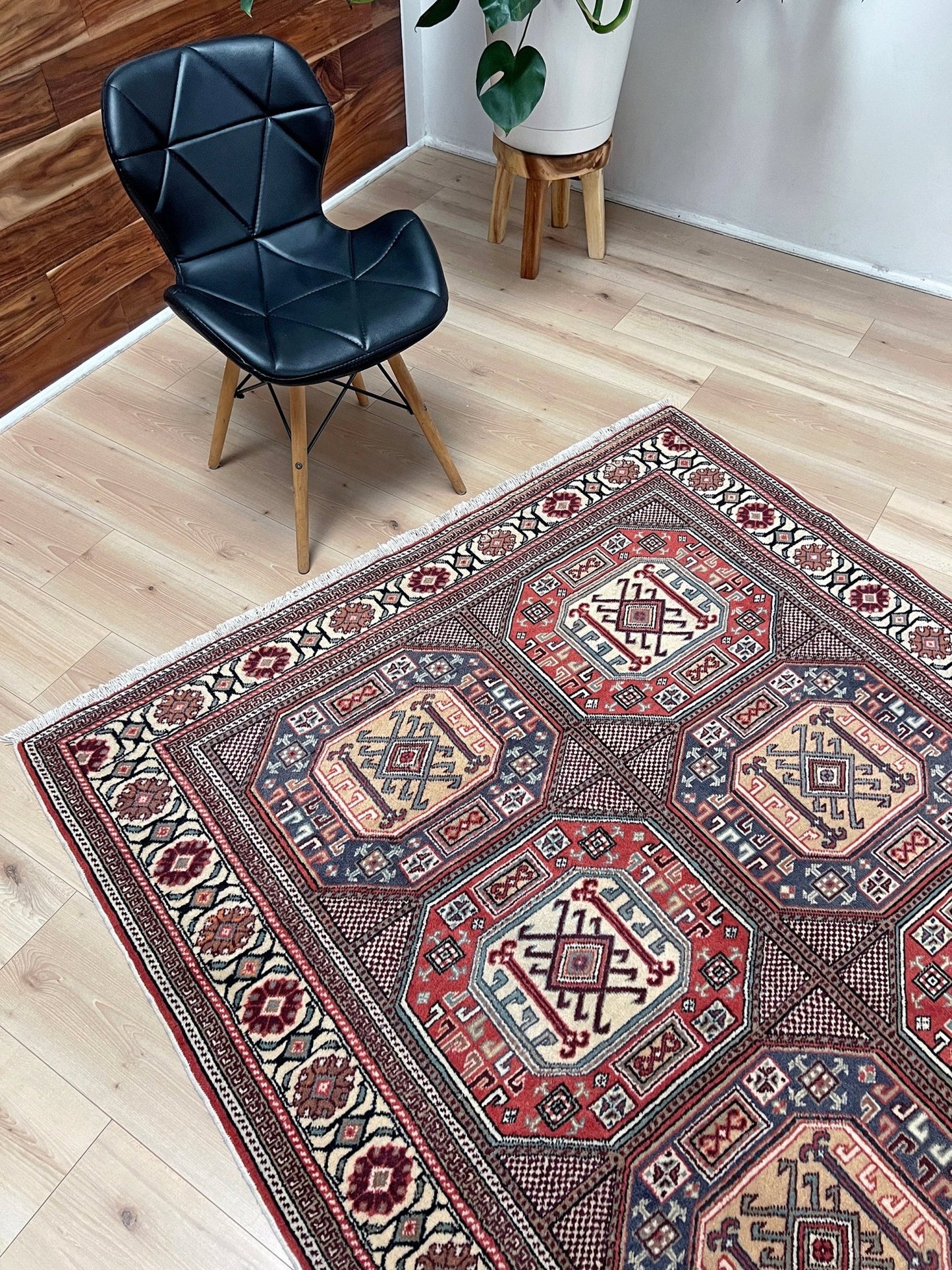 Luxurious 5x7 Turkish tribal rug with geometric 'chest' octagonal medallions and intricate checkered pattern in earth colors. Handmade and available from the best luxury rug shop in the San Francisco Bay Area. Free shipping