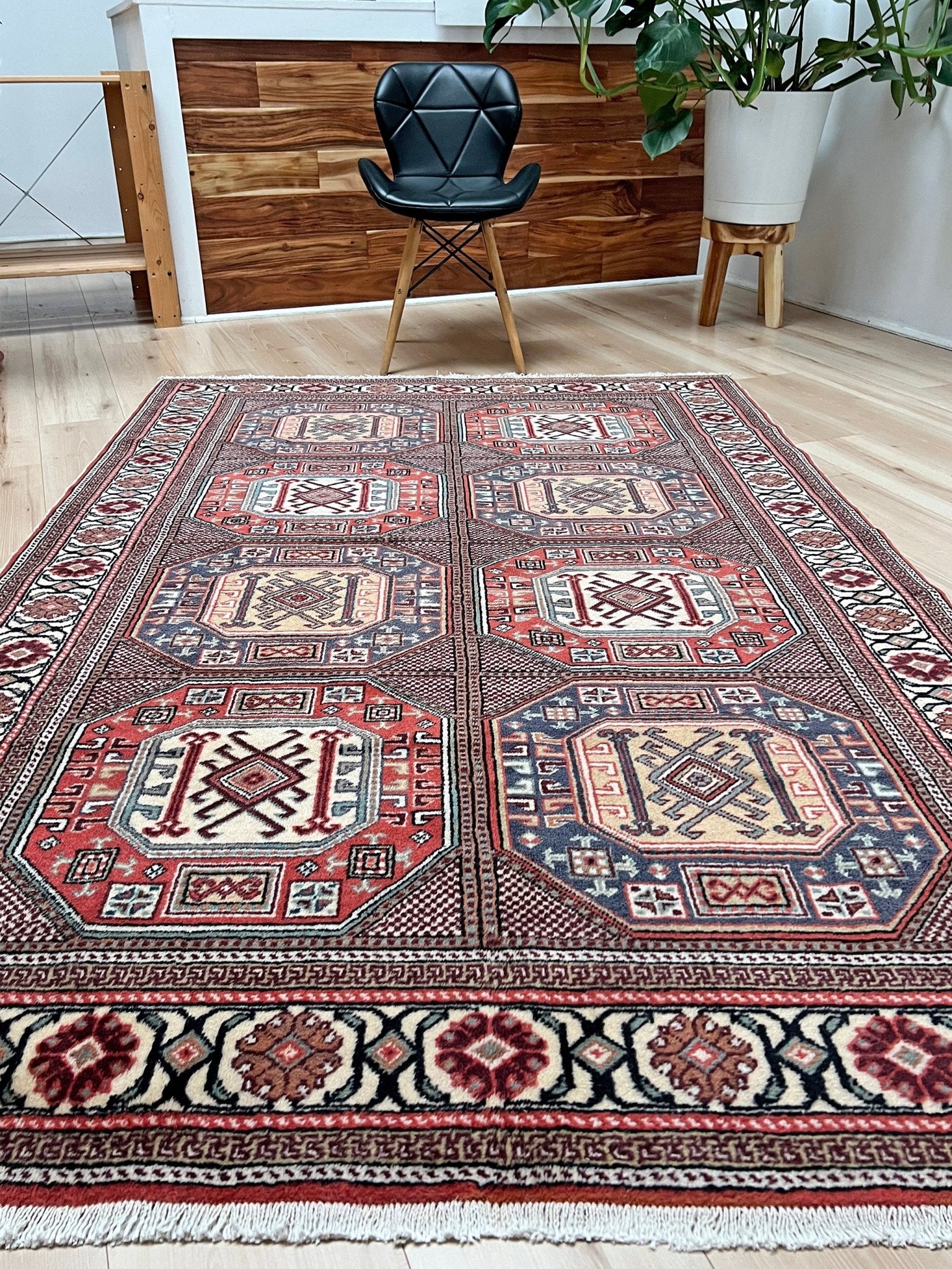 Luxurious 5x7 Turkish tribal rug with geometric 'chest' octagonal medallions and intricate checkered pattern in earth colors. Handmade and available from the best luxury rug shop in the San Francisco Bay Area. Free shipping