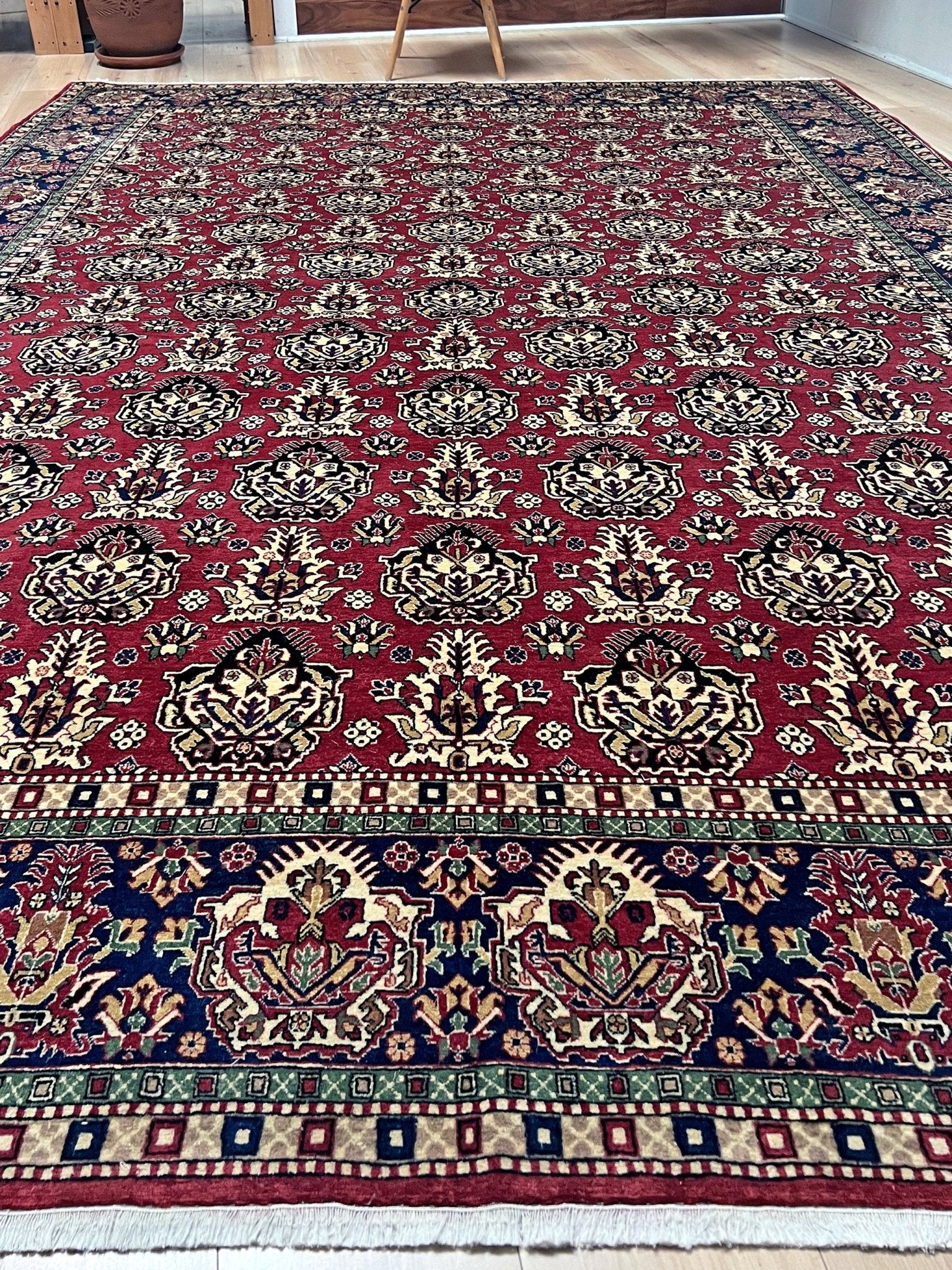 8x11 ft Hereke vintage Turkish luxury rug with crown-like floral motifs, perfect for living rooms, bedrooms, or dining spaces. This elegant handmade wool-on-cotton carpet is in pristine condition with authentic 'HEREKE' marking. From the best luxury handmade rug shop in the San Francisco Bay Area, offering free shipping. Add this timeless piece to your home for unmatched sophistication and style.