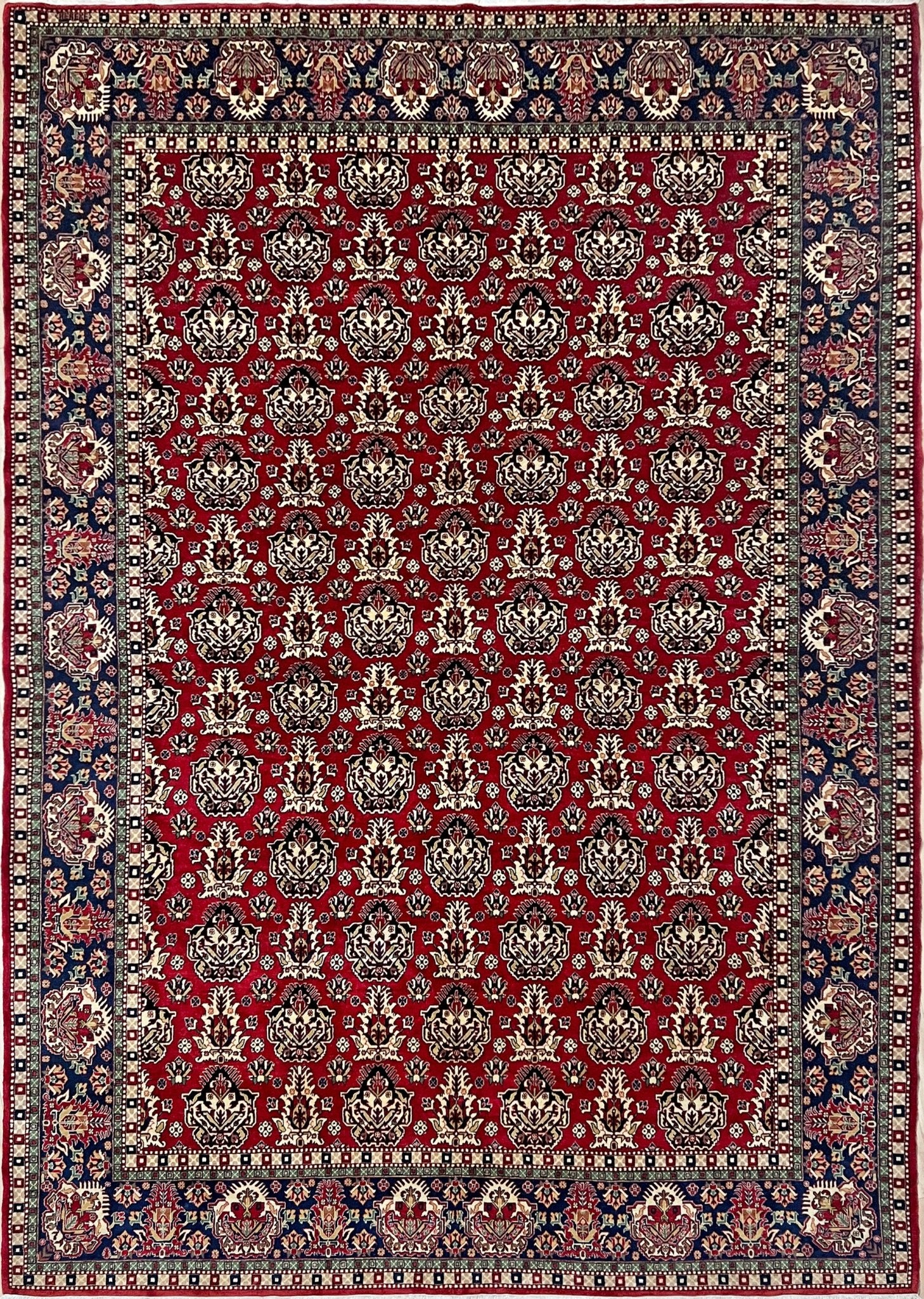 8x10 ft Hereke vintage Turkish luxury rug with crown-like floral motifs, perfect for living rooms, bedrooms, or dining spaces. This elegant handmade wool-on-cotton carpet is in pristine condition with authentic 'HEREKE' marking. From the best luxury handmade rug shop in the San Francisco Bay Area, offering free shipping. Add this timeless piece to your home for unmatched sophistication and style.