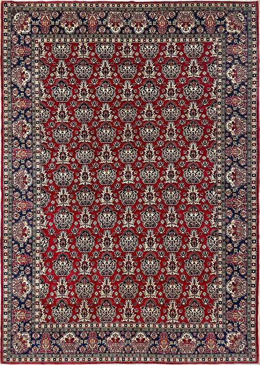 8x10 ft Hereke vintage Turkish luxury rug with crown-like floral motifs, perfect for living rooms, bedrooms, or dining spaces. This elegant handmade wool-on-cotton carpet is in pristine condition with authentic 'HEREKE' marking. From the best luxury handmade rug shop in the San Francisco Bay Area, offering free shipping. Add this timeless piece to your home for unmatched sophistication and style.