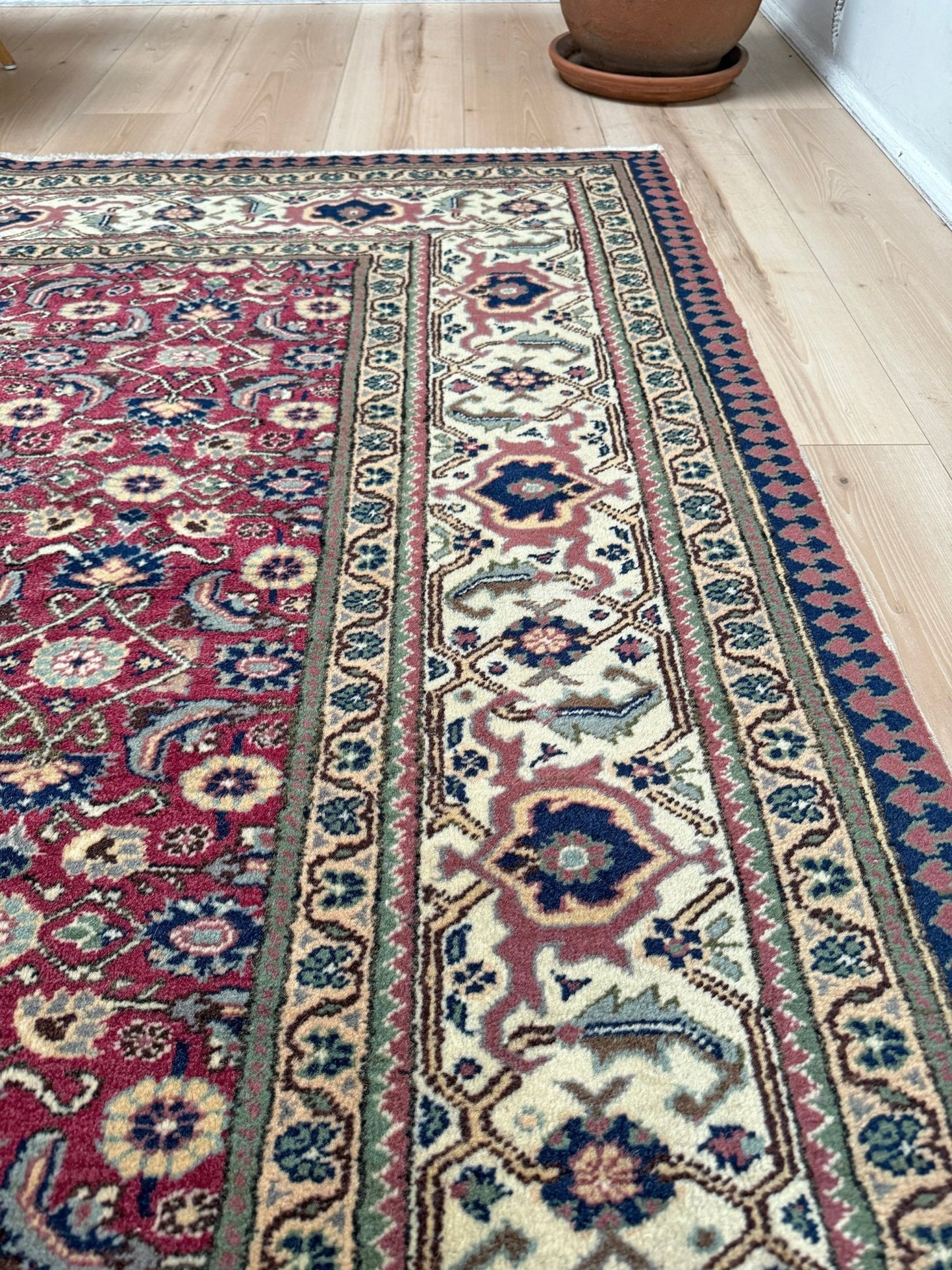 Vintage Turkish floral 8x10 rug with Caucasian design in ruby red, cream, and navy blue, perfect for living rooms, bedrooms, and dining rooms. Complements traditional, eclectic, bohemian, and classic home décor styles. From the best rug shop in Burlingame, SF Bay Area, with free shipping.