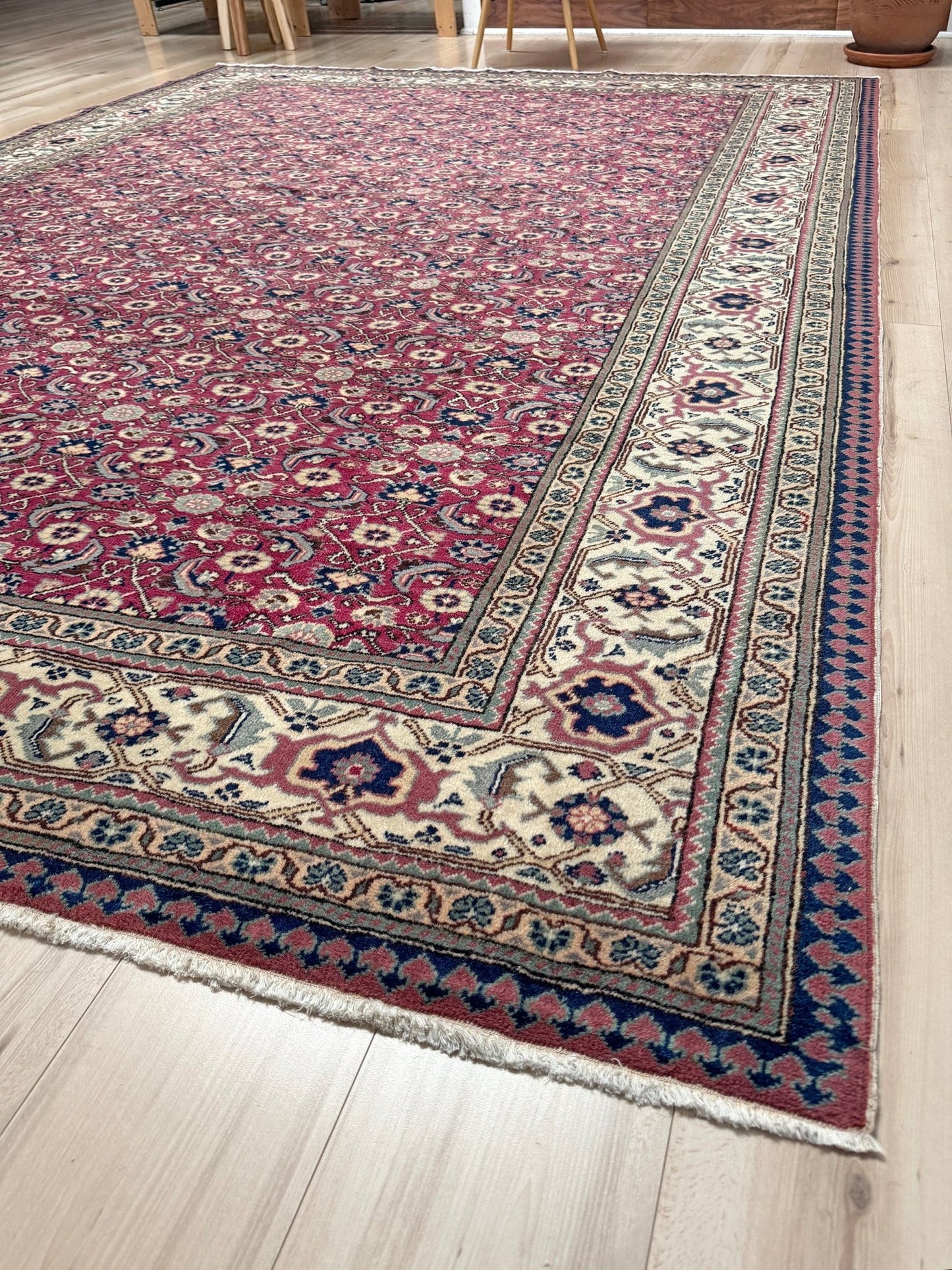 Vintage Turkish floral 8x10 rug with Caucasian design in ruby red, cream, and navy blue, perfect for living rooms, bedrooms, and dining rooms. Complements traditional, eclectic, bohemian, and classic home décor styles. From the best rug shop in Burlingame, SF Bay Area, with free shipping.