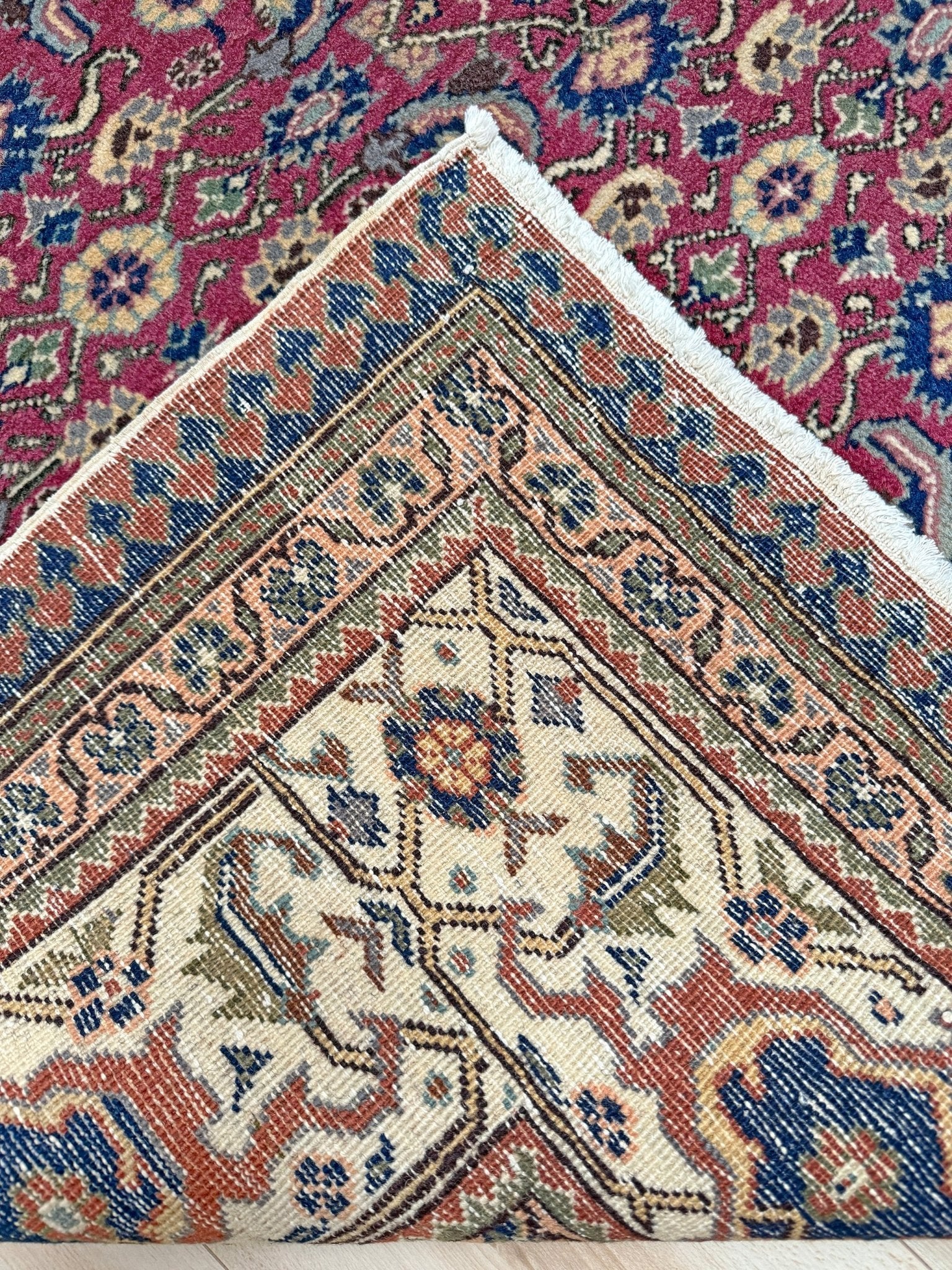 Vintage Turkish floral 8x10 rug with Caucasian design in ruby red, cream, and navy blue, perfect for living rooms, bedrooms, and dining rooms. Complements traditional, eclectic, bohemian, and classic home décor styles. From the best rug shop in Burlingame, SF Bay Area, with free shipping.