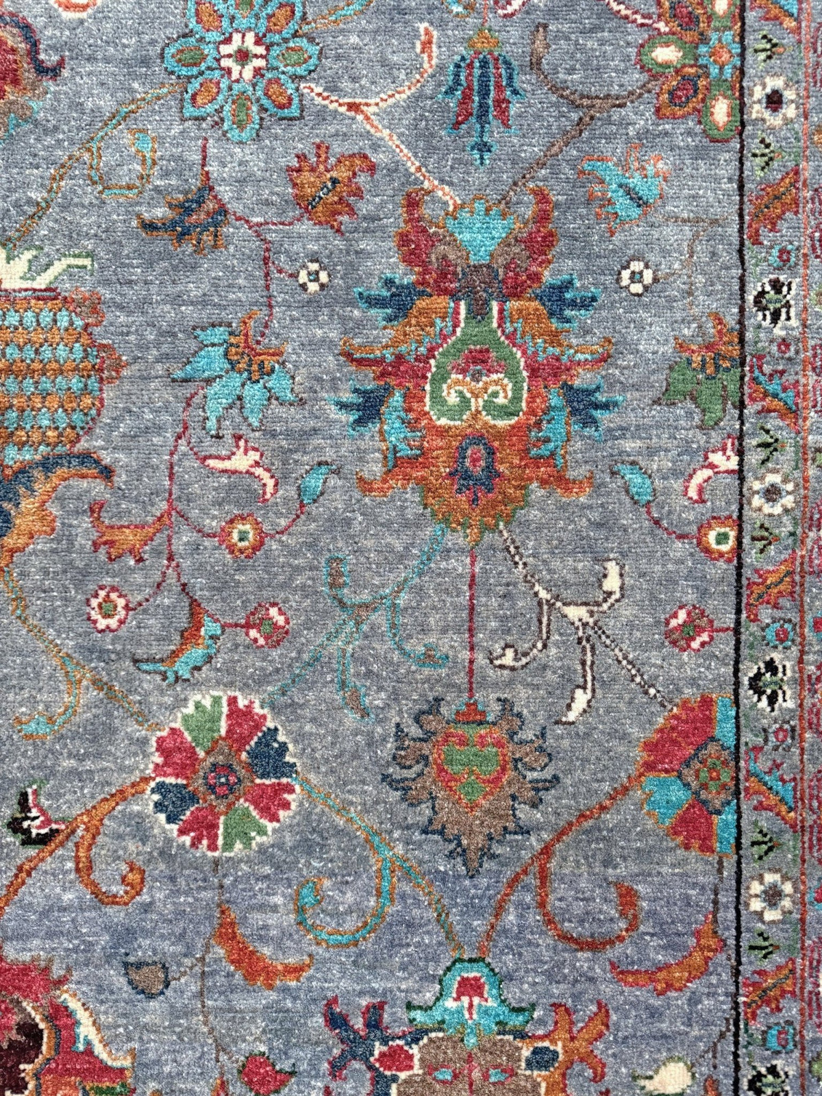 Blue gray Ziegler Turkish rug with floral accents, handmade wool 7x9 area rug from Indigo Rugs Burlingame Bay Area.