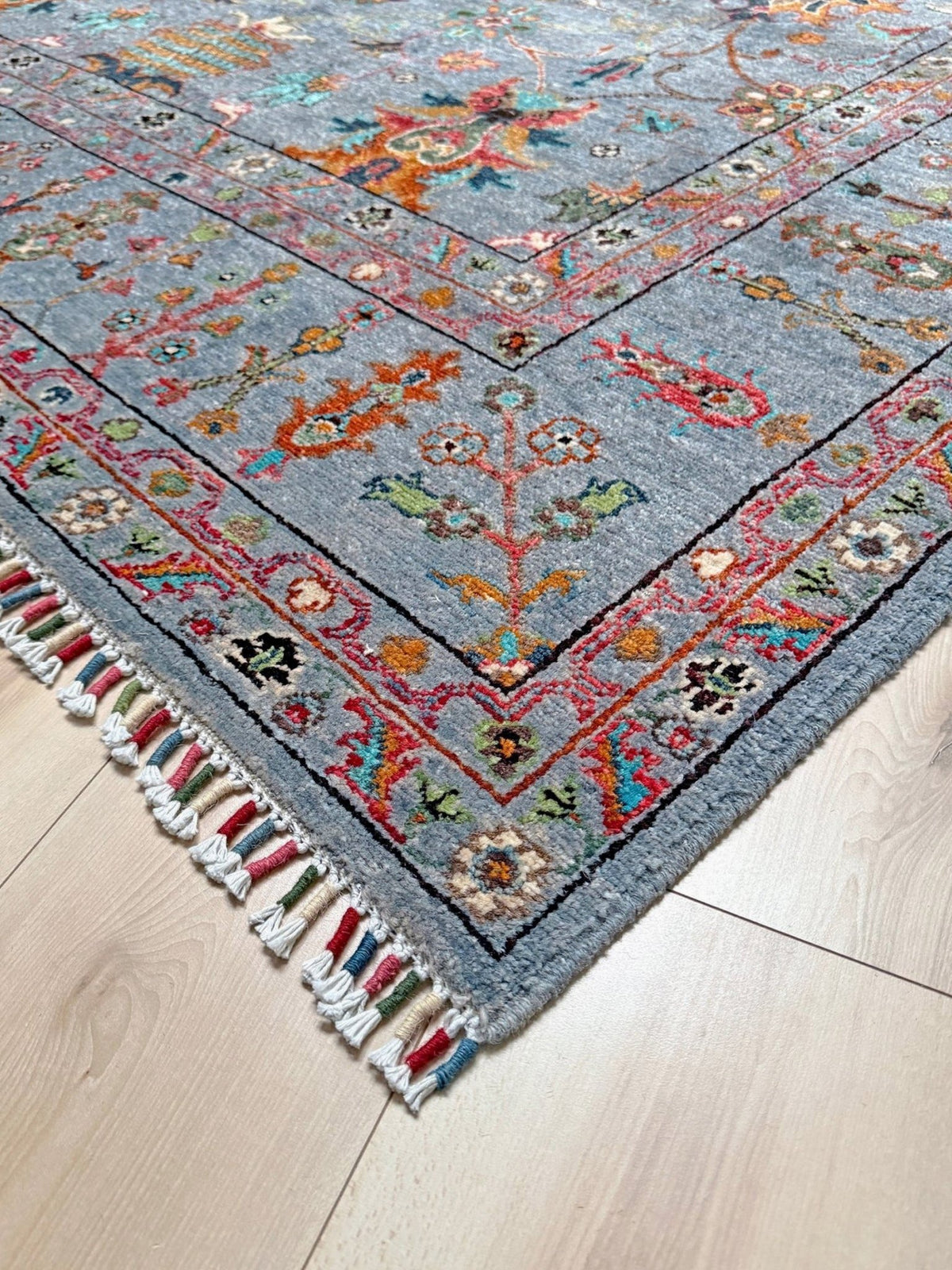 Blue gray Ziegler Turkish rug with floral accents, handmade wool 7x9 area rug from Indigo Rugs Burlingame Bay Area.