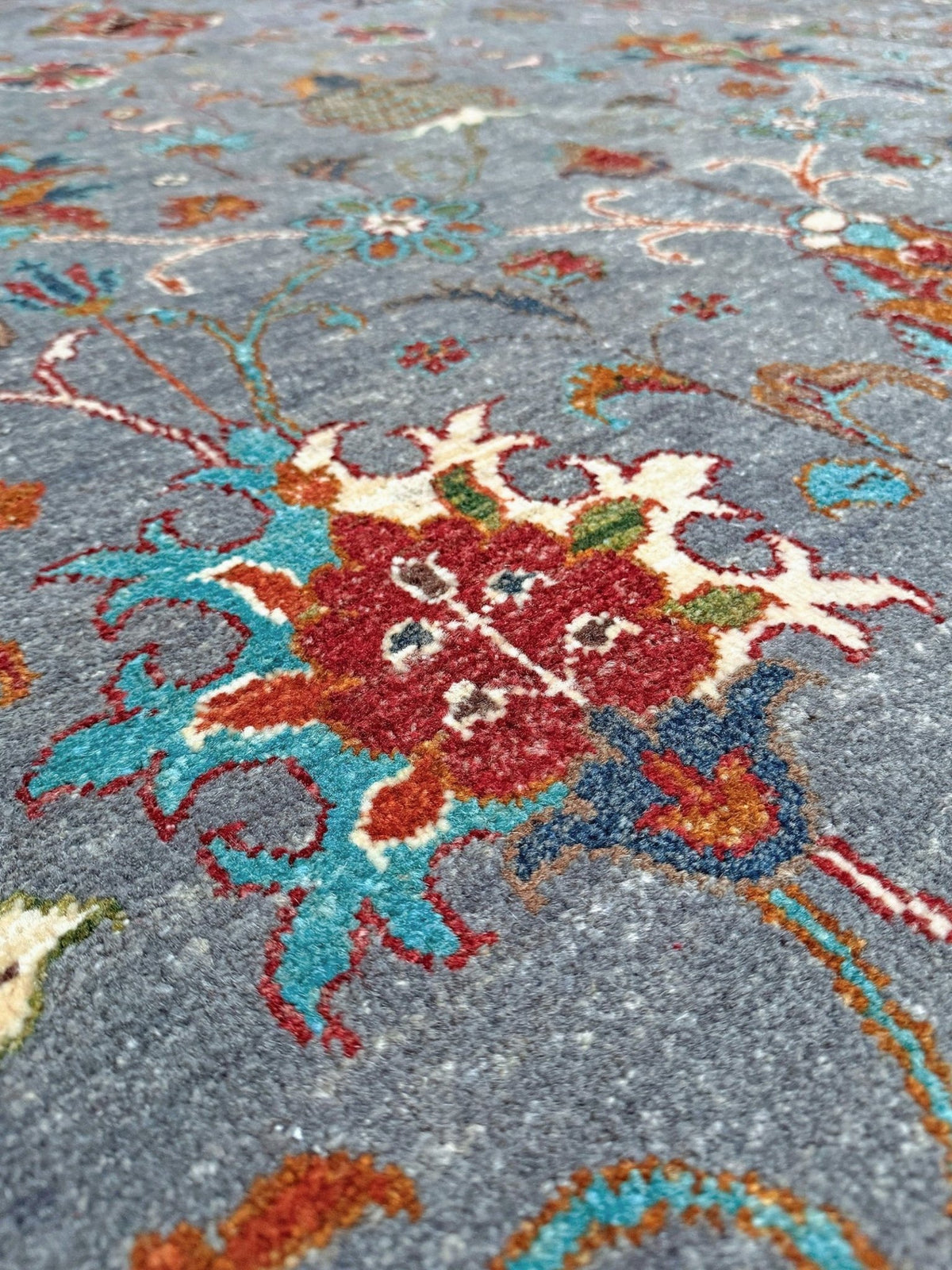 Blue gray Ziegler Turkish rug with floral accents, handmade wool 7x9 area rug from Indigo Rugs Burlingame Bay Area.