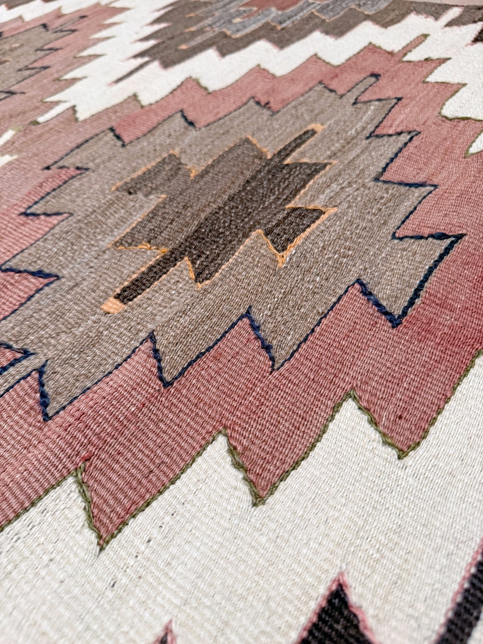 Vintage Mut kilim rug with Navajo-style diamond medallions in dusty rose, taupe, and chocolate brown — handmade Turkish flatweave from 1970s, available at Indigo Rugs, Burlingame / San Francisco Bay Area.”