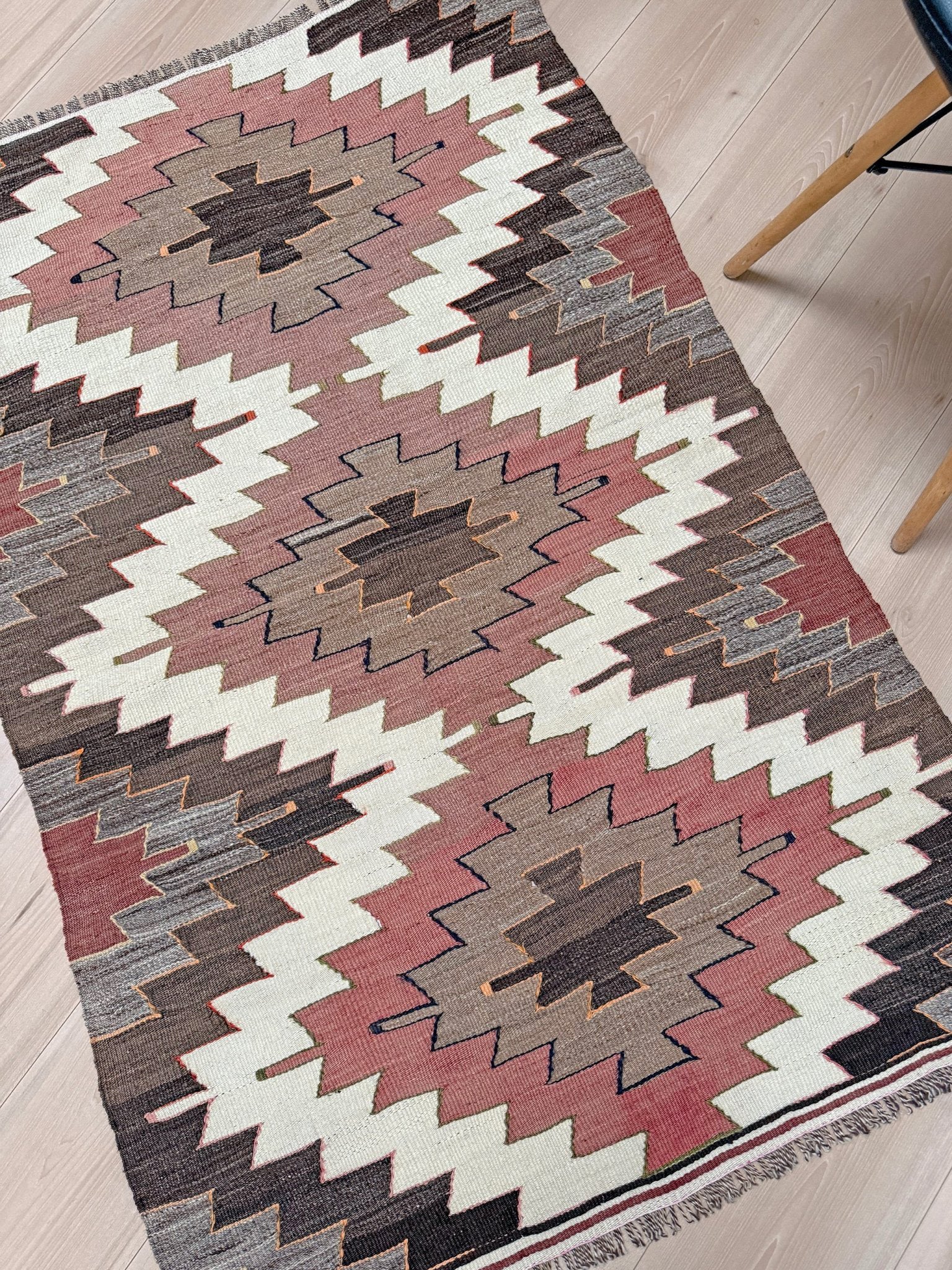 3x5  Mut kilim rug with Navajo-style diamond medallions in dusty rose, taupe, and chocolate brown — handmade Turkish flatweave, available at Indigo Rugs, Burlingame / San Francisco Bay Area.”