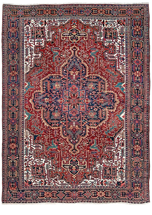 10x14 oversize handmade Persian Heriz vintage rug madder red and navy — shown in living room at Indigo Rugs, Burlingame — San Francisco Bay Area with free shipping