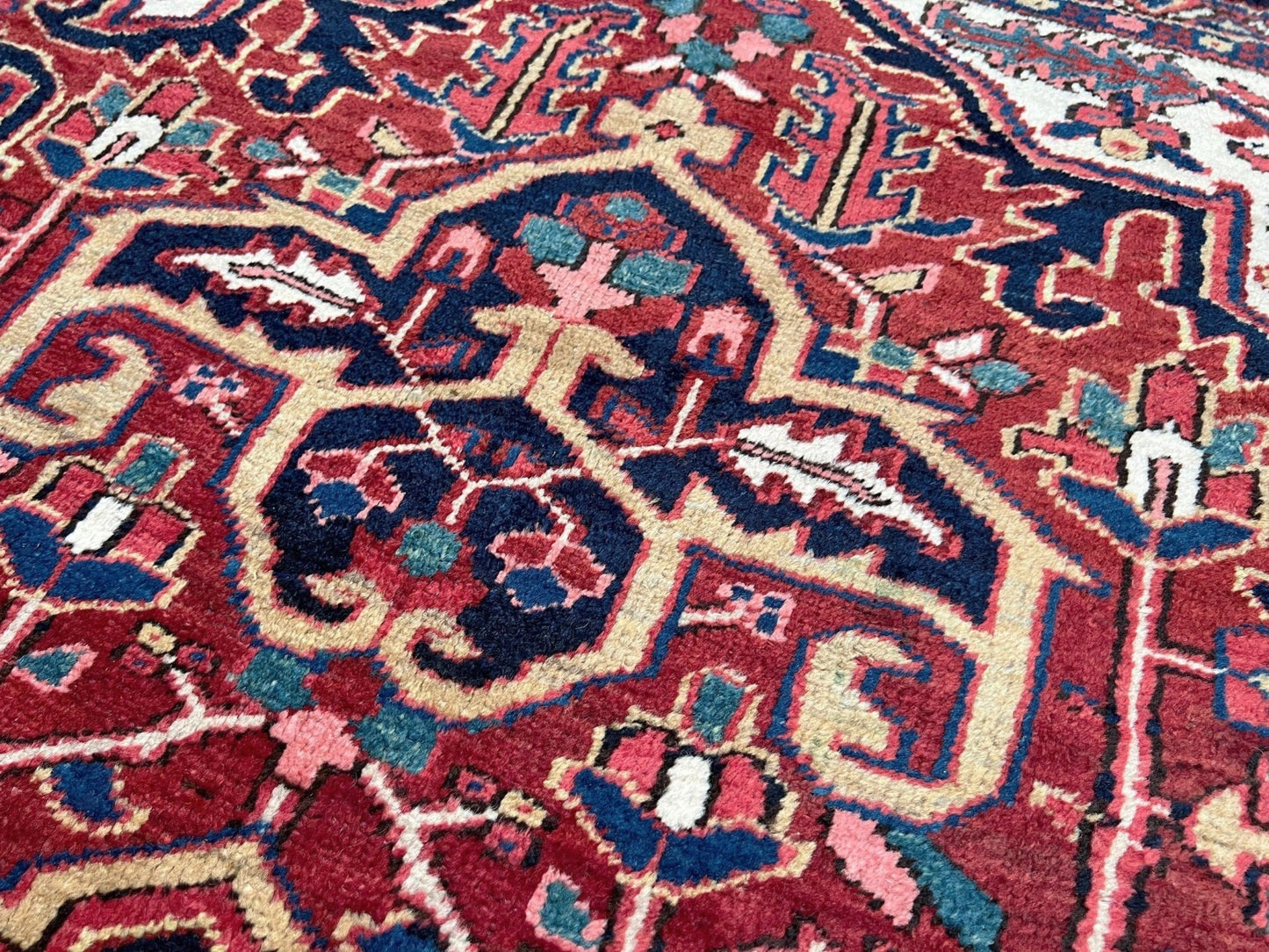 10x14 oversize handmade Persian Heriz vintage rug madder red and navy — shown in living room at Indigo Rugs, Burlingame — San Francisco Bay Area with free shipping