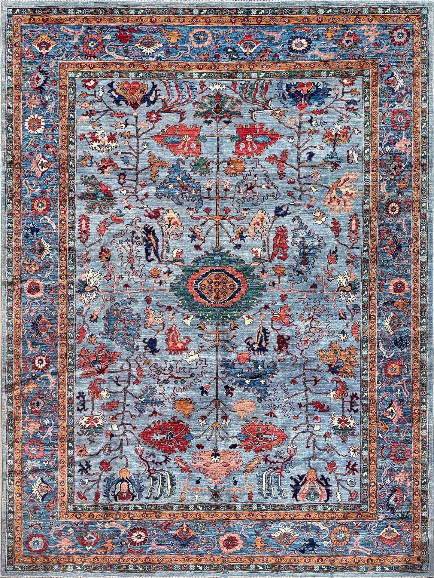 9x12 handmade luxury floral rug with dusty blue background and rich cobalt border, exclusive to the best rug shop in San Mateo, SF Bay Area – perfect for bedroom, living room, or dining room décor, with free shipping included.