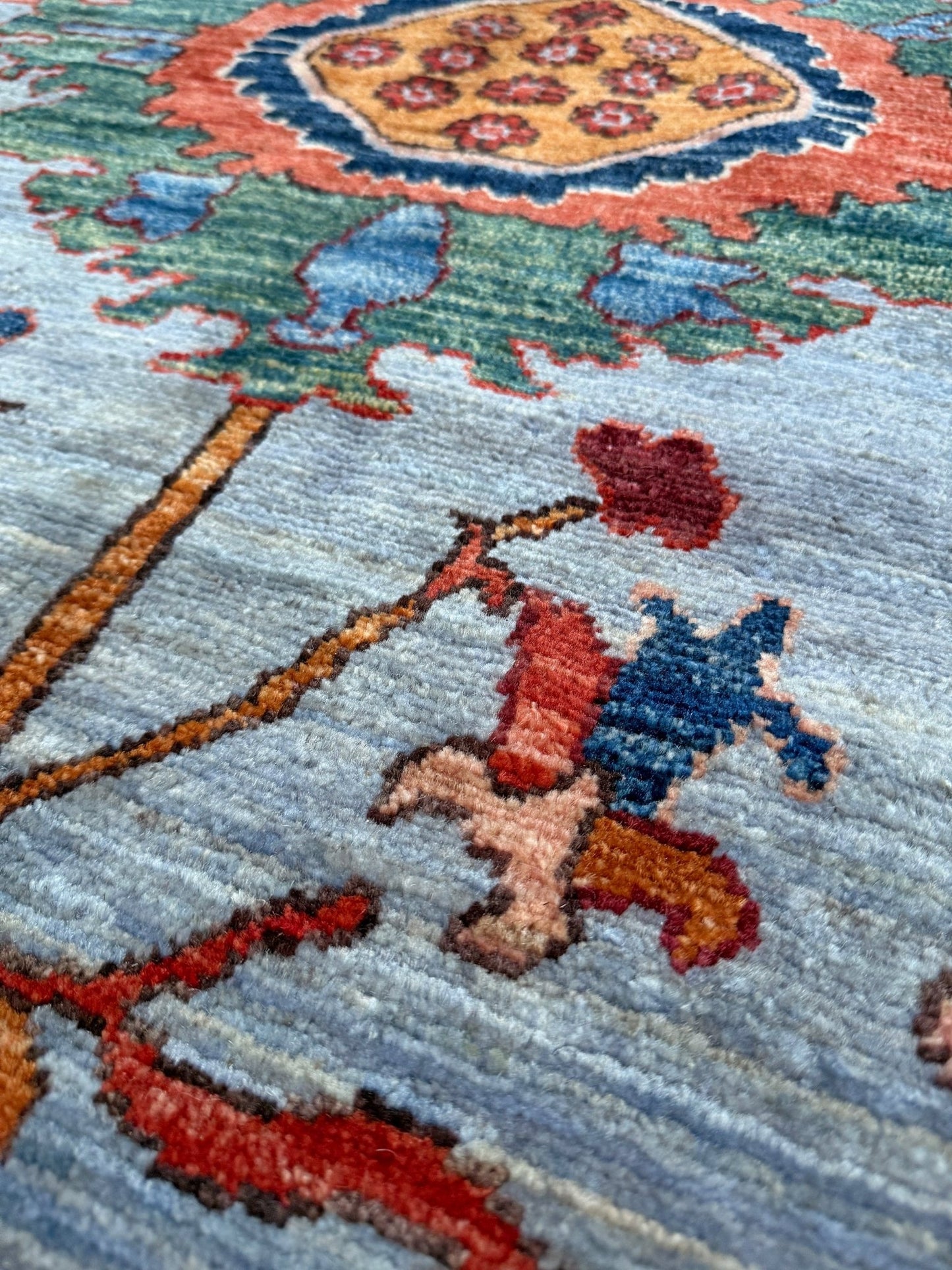 9x12 handmade luxury floral rug with dusty blue background and rich cobalt border, exclusive to the best rug shop in San Mateo, SF Bay Area – perfect for bedroom, living room, or dining room décor, with free shipping included.