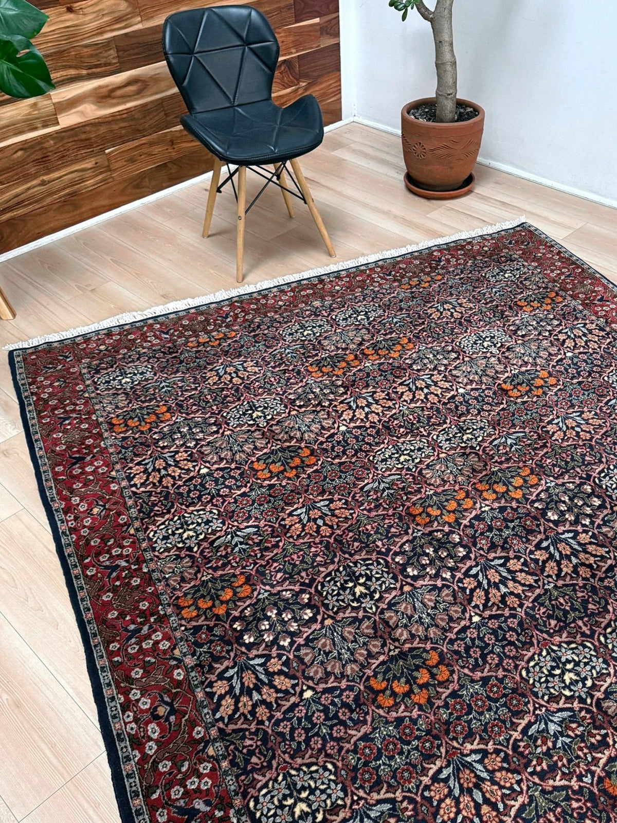 Vintage 7x9 Watermelon Hereke Turkish floral rug with midnight blue field, maroon border. Perfect for living rooms, dining spaces, or bedrooms. From the best rug shop in Burlingame, San Francisco Bay Area, CA