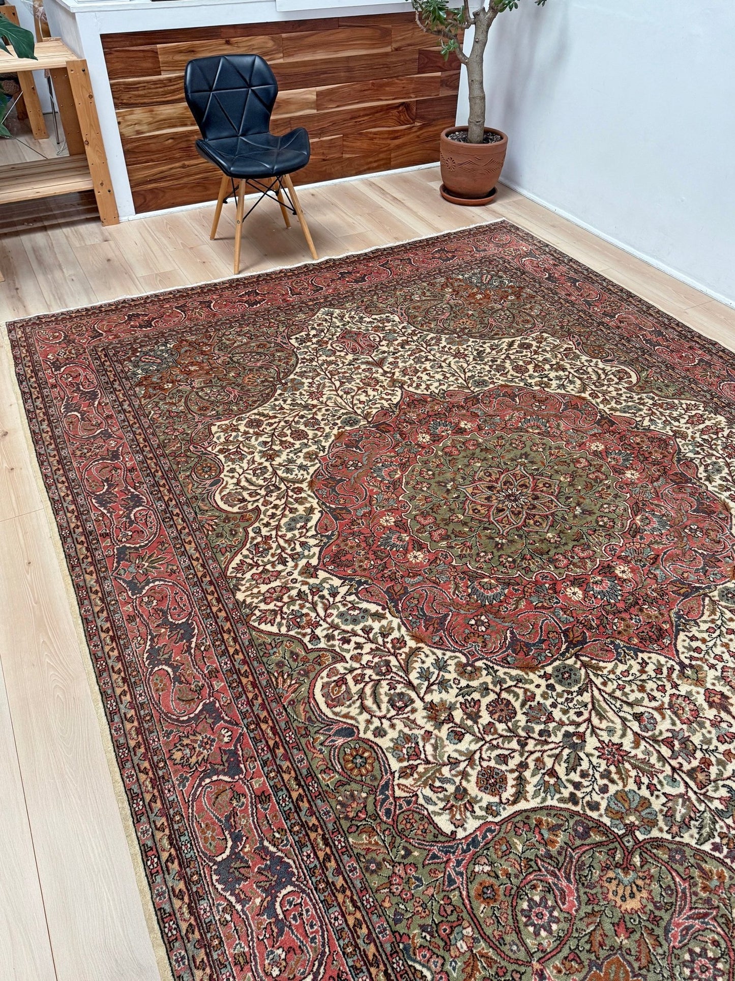 Pink and brown vintage Turkish rug. This luxurious 9x12 handmade wool carpet is available in Burlingame CA SF Bay Area with free shipping, perfect for adding a touch of elegance to any home decor.