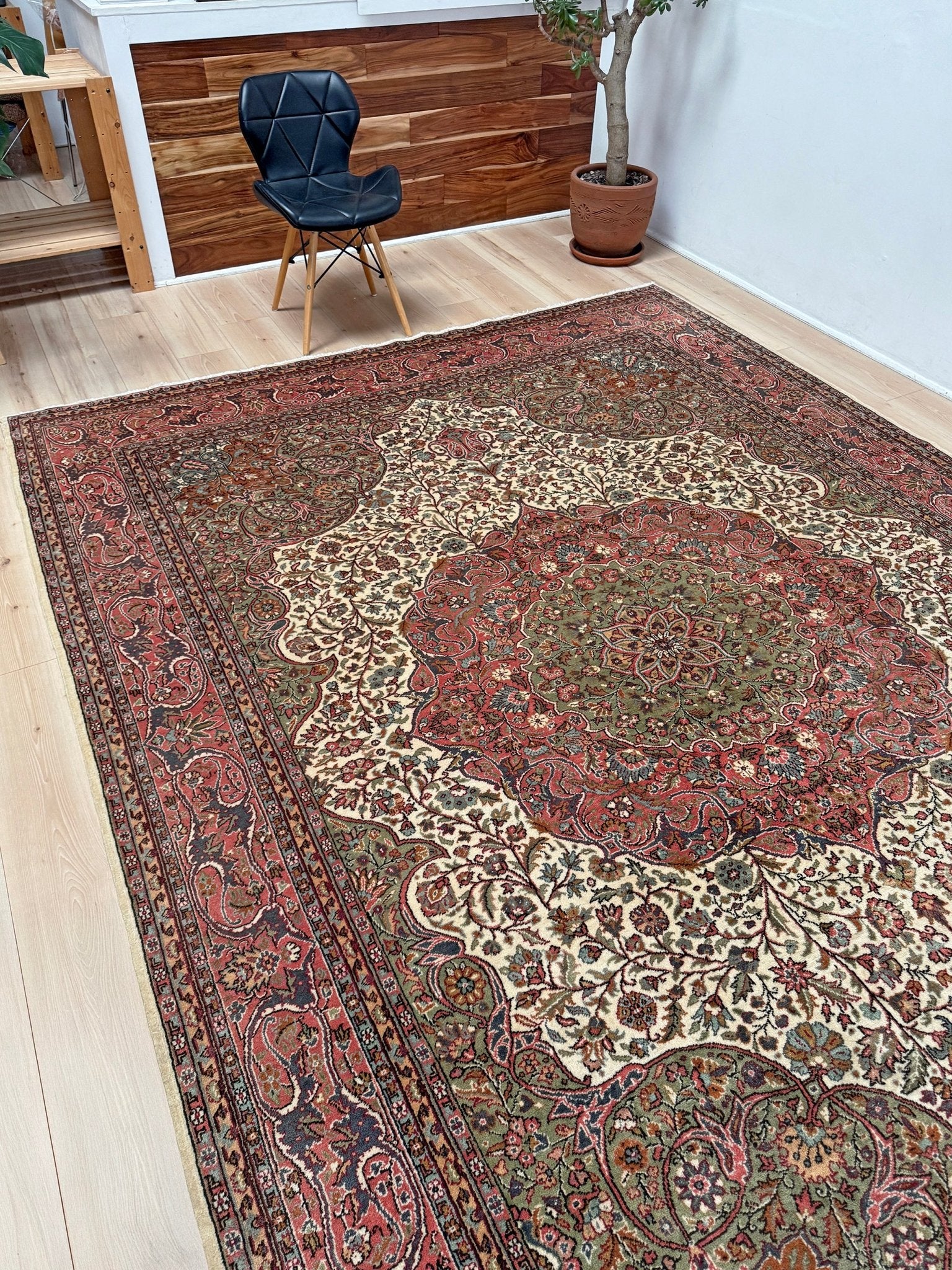 Pink and brown vintage Turkish rug. This luxurious 9x12 handmade wool carpet is available in Burlingame CA SF Bay Area with free shipping, perfect for adding a touch of elegance to any home decor.