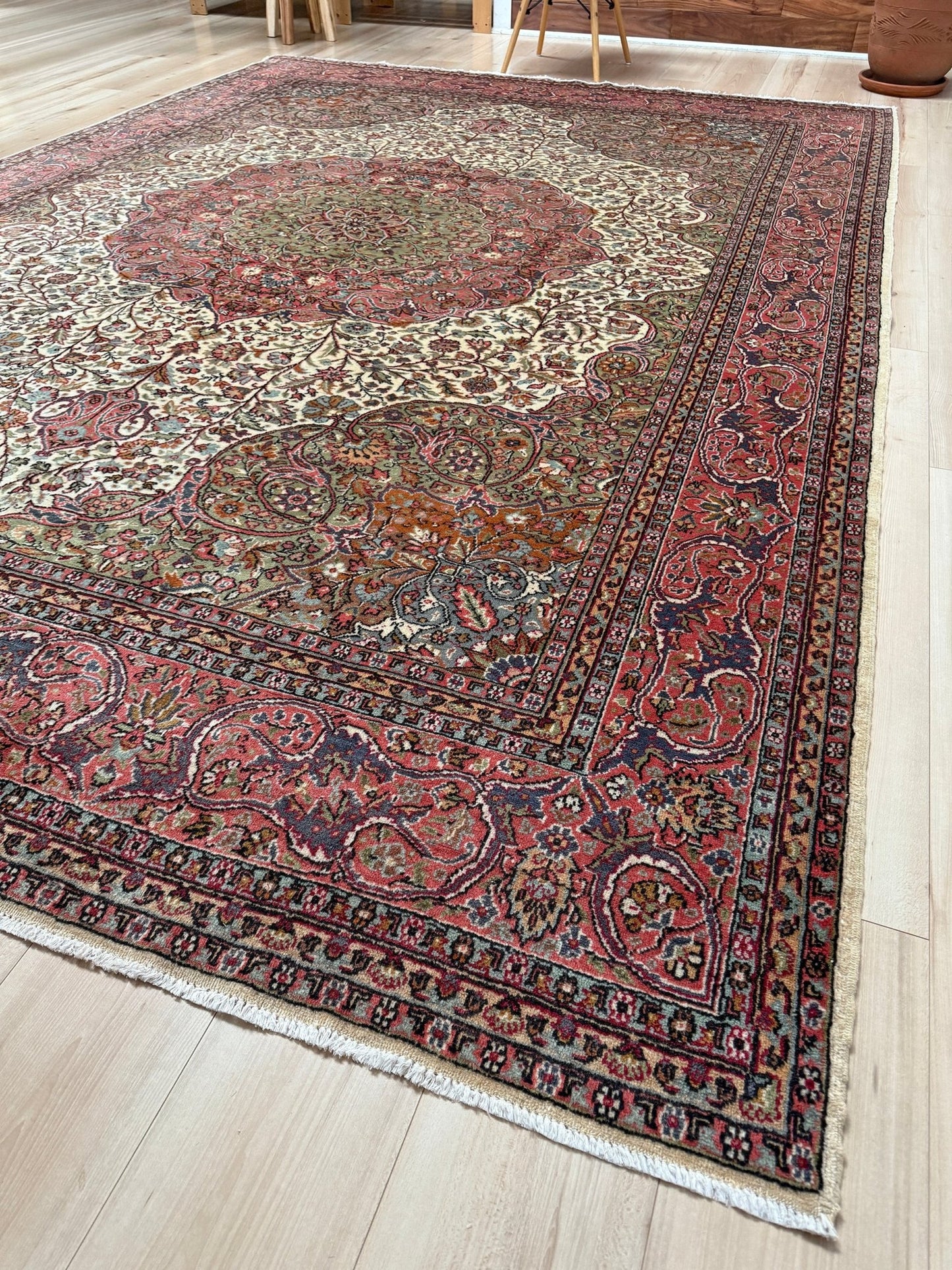 Pink and brown vintage Turkish rug. This luxurious 9x12 handmade wool carpet is available in Burlingame CA SF Bay Area with free shipping, perfect for adding a touch of elegance to any home decor.