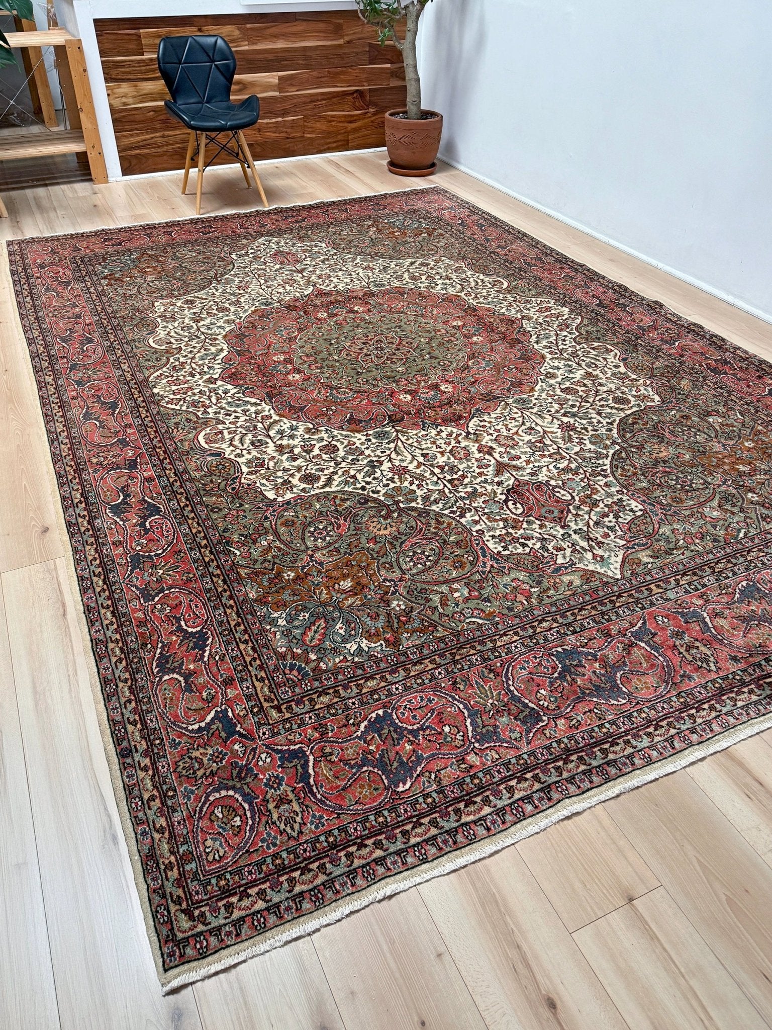 Pink and brown vintage Turkish rug. This luxurious 9x12 handmade wool carpet is available in Burlingame CA SF Bay Area with free shipping, perfect for adding a touch of elegance to any home decor.