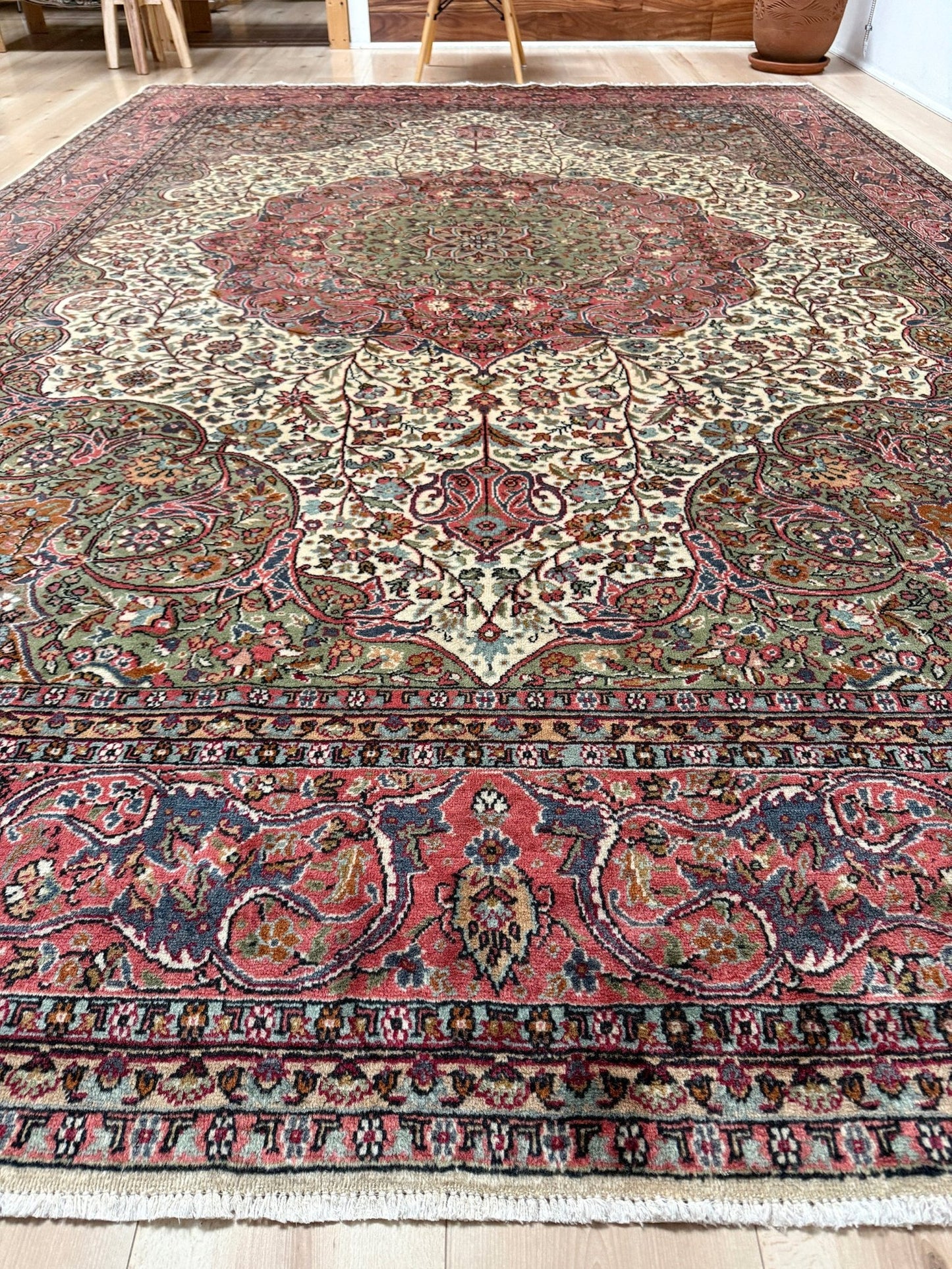 Pink and brown vintage Turkish rug. This luxurious 9x12 handmade wool carpet is available in Burlingame CA SF Bay Area with free shipping, perfect for adding a touch of elegance to any home decor.