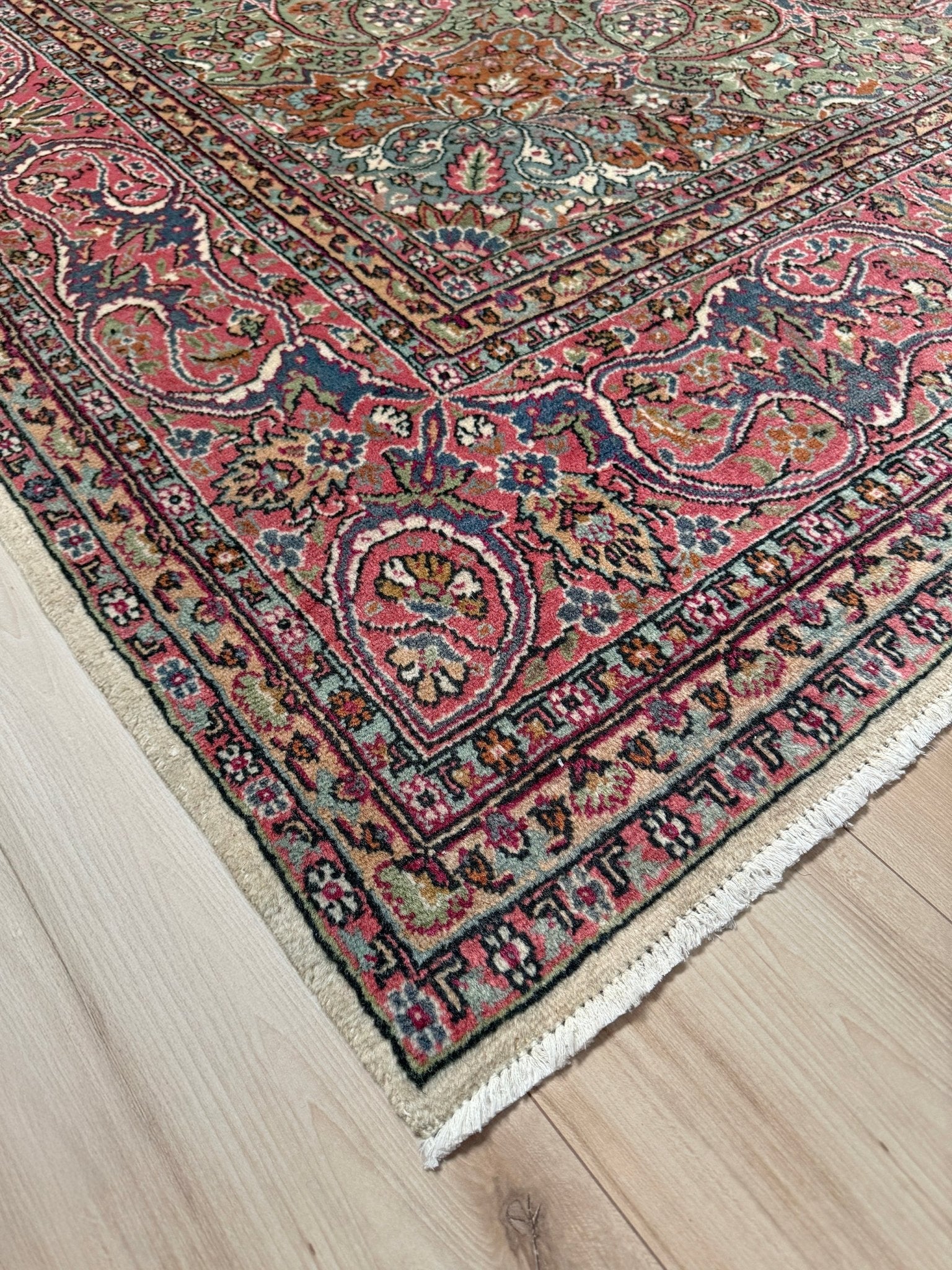 Pink and brown vintage Turkish rug. This luxurious 9x12 handmade wool carpet is available in Burlingame CA SF Bay Area with free shipping, perfect for adding a touch of elegance to any home decor.