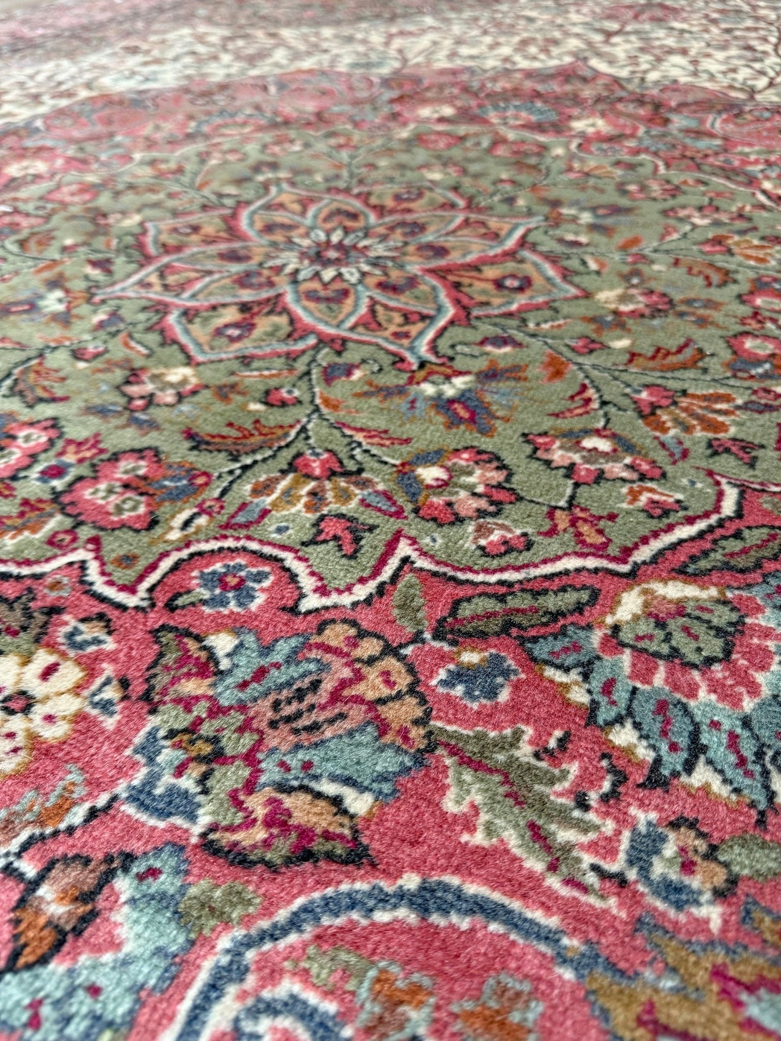 Pink and brown vintage Turkish rug. This luxurious 9x12 handmade wool carpet is available in Burlingame CA SF Bay Area with free shipping, perfect for adding a touch of elegance to any home decor.