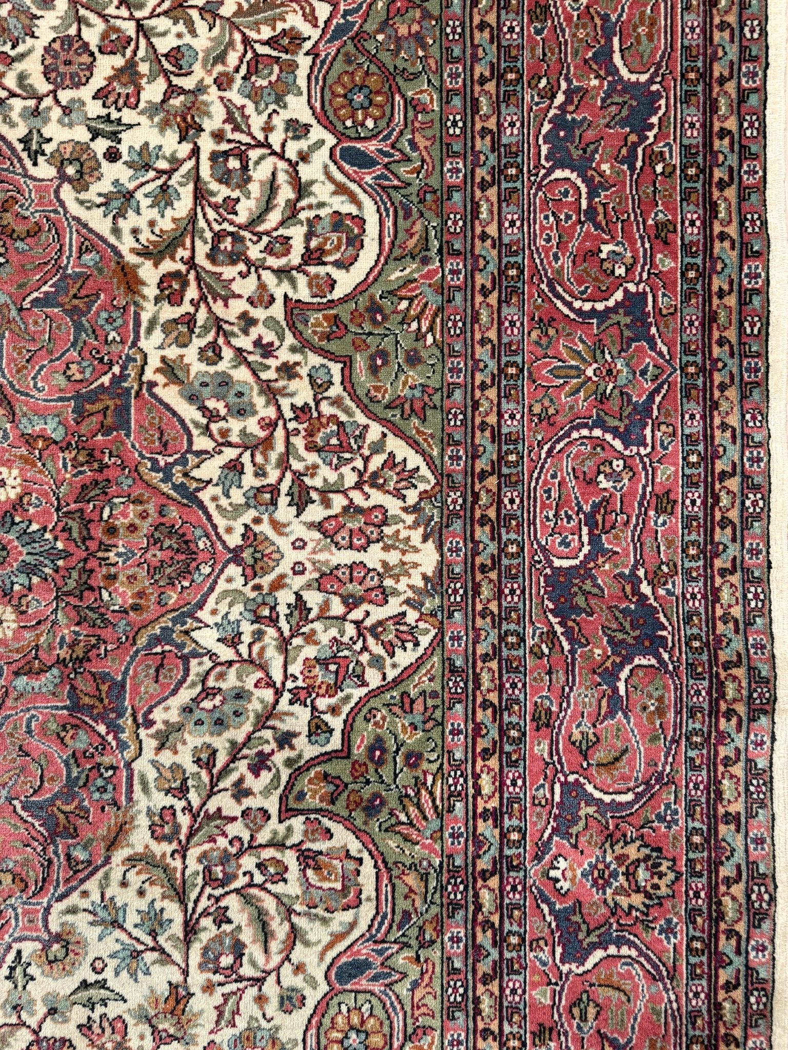 Pink and brown vintage Turkish rug. This luxurious 9x12 handmade wool carpet is available in Burlingame CA SF Bay Area with free shipping, perfect for adding a touch of elegance to any home decor.