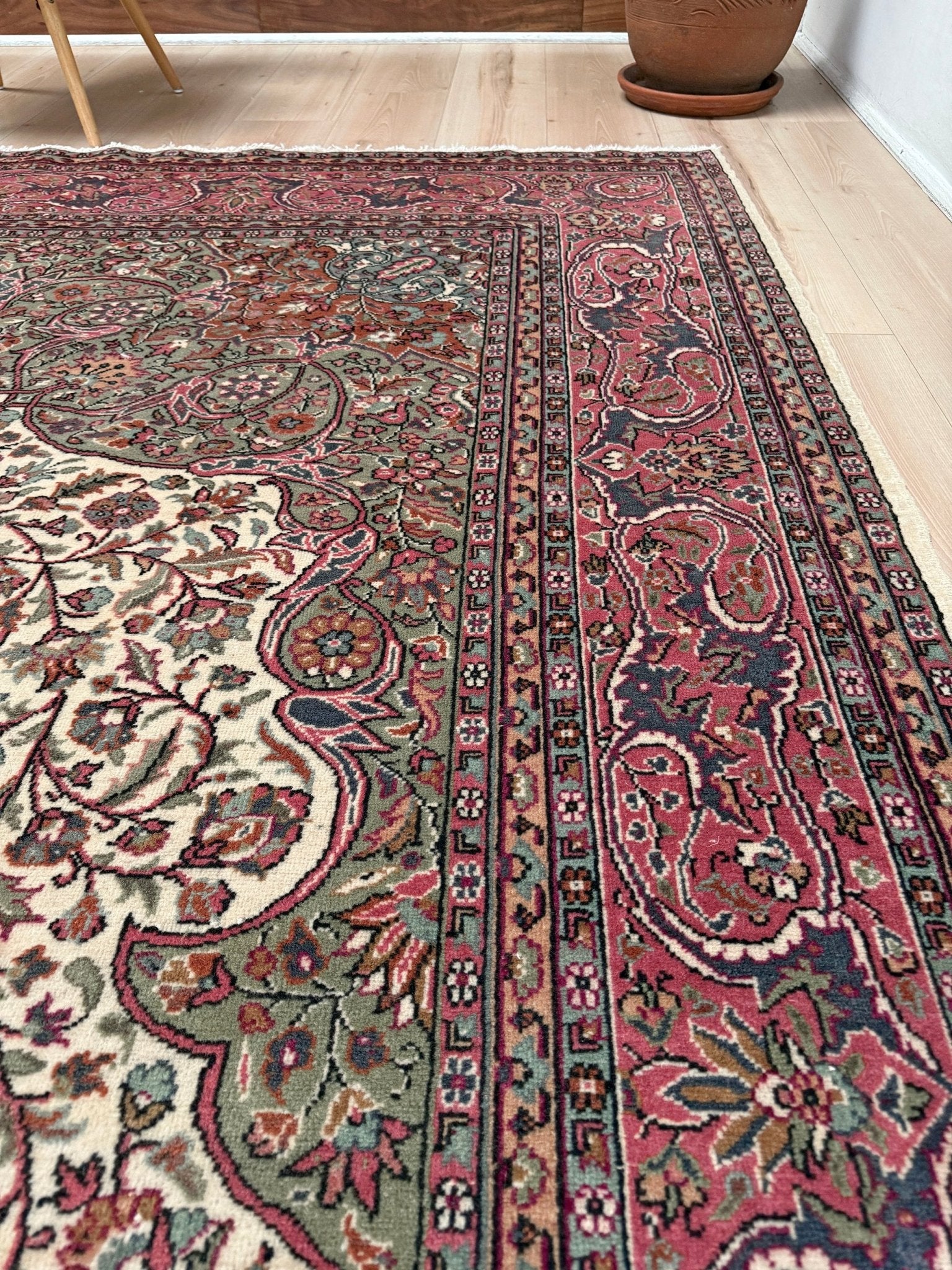Pink and brown vintage Turkish rug. This luxurious 9x12 handmade wool carpet is available in Burlingame CA SF Bay Area with free shipping, perfect for adding a touch of elegance to any home decor.