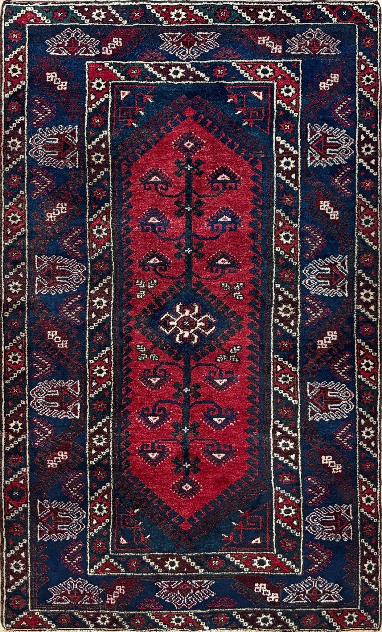 5x7 Dosemealti vintage Turkish tribal rug – top-quality wool, rich crimson red and midnight blue hues, intricate geometric and floral patterns. Perfect for bedroom, living room, or dining area. Handwoven with character and history. Available at the best rug shop in Burlingame CA, SF Bay Area – free shipping!