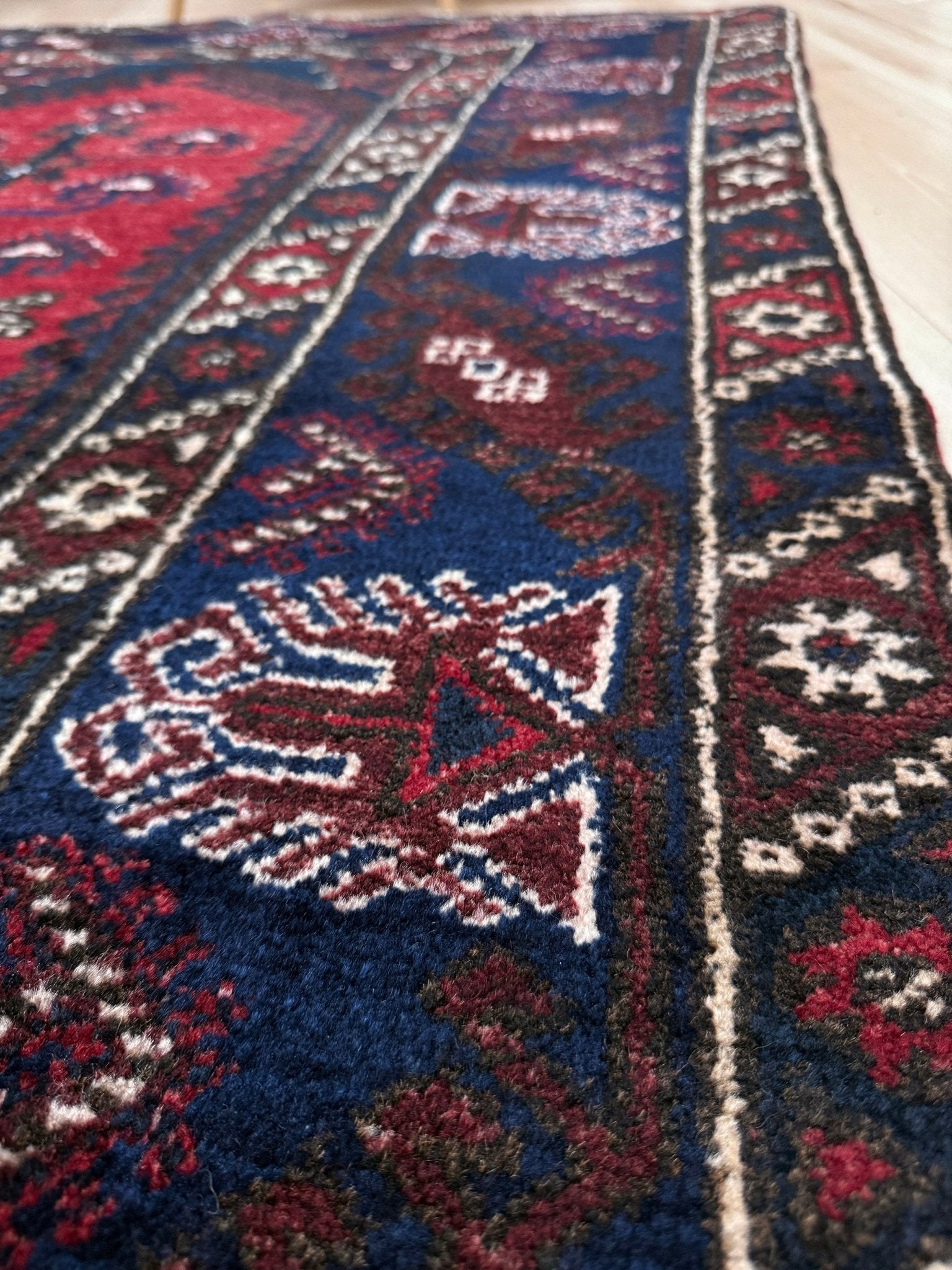 5x7 Dosemealti vintage Turkish tribal rug – top-quality wool, rich crimson red and midnight blue hues, intricate geometric and floral patterns. Perfect for bedroom, living room, or dining area. Handwoven with character and history. Available at the best rug shop in Burlingame CA, SF Bay Area – free shipping!