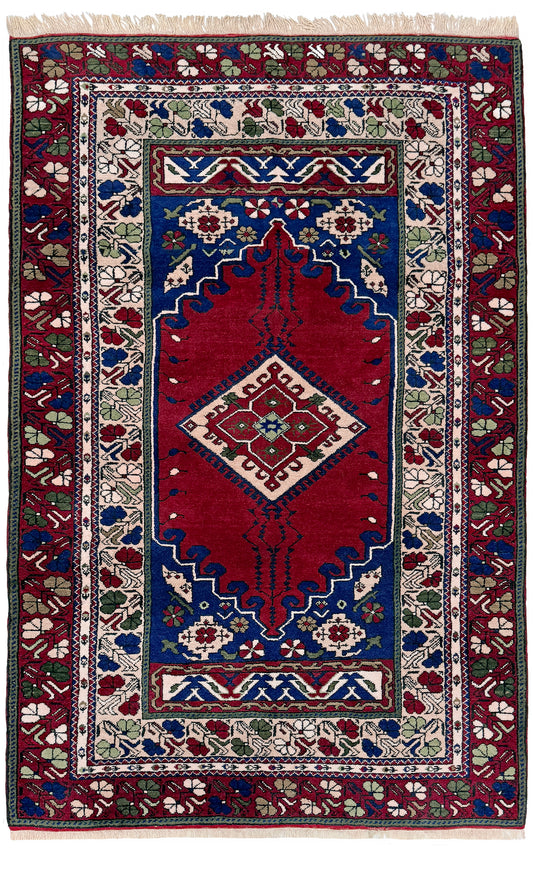 crimson red vibrant anatolian turkish vintage rug 5x7 traditional handmade village wool rug blue medallion floral border plush pile indigo rugs san francisco bay area