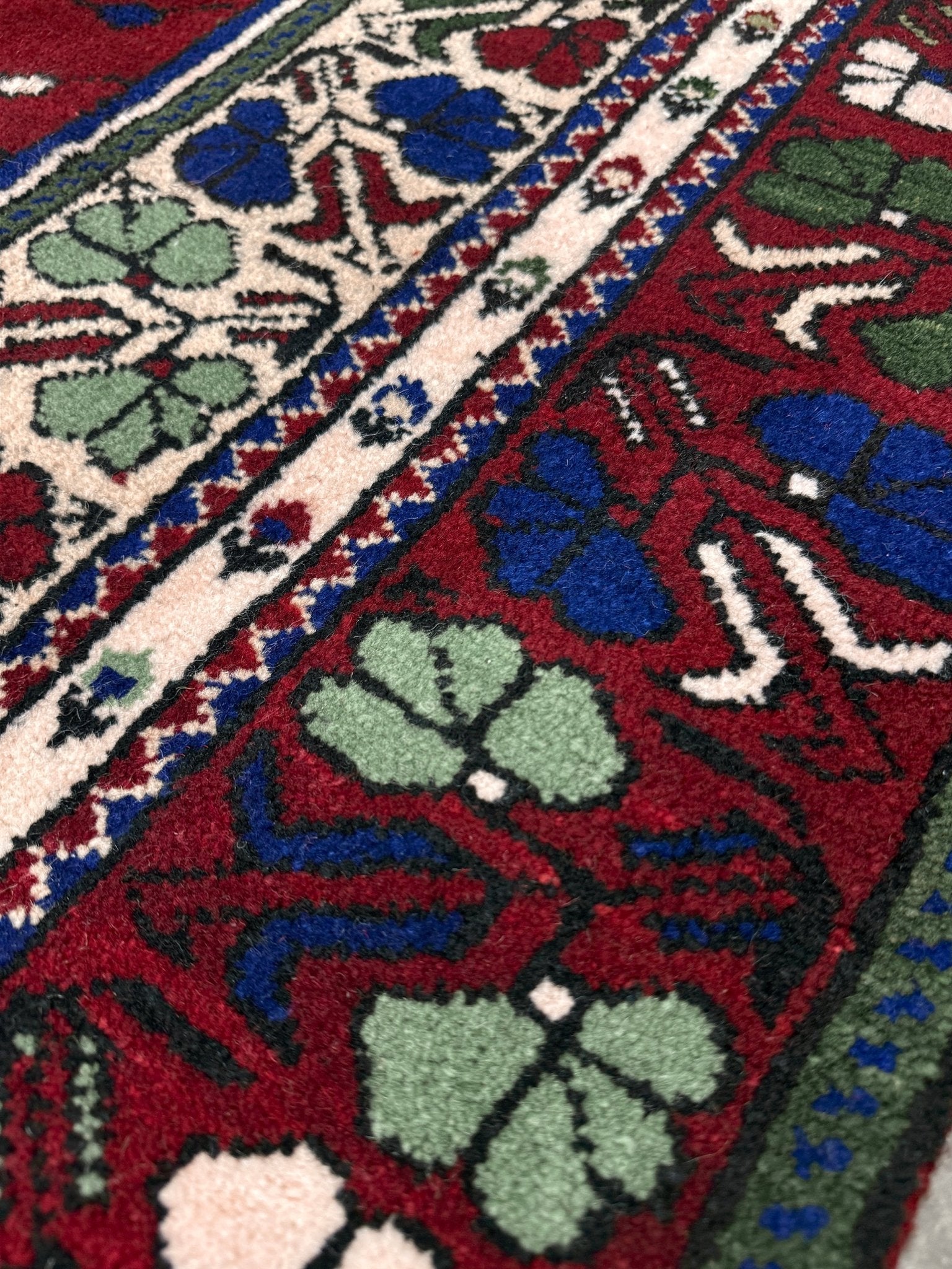 crimson red vibrant anatolian turkish vintage rug 5x7 traditional handmade village wool rug blue medallion floral border plush pile indigo rugs san francisco bay area