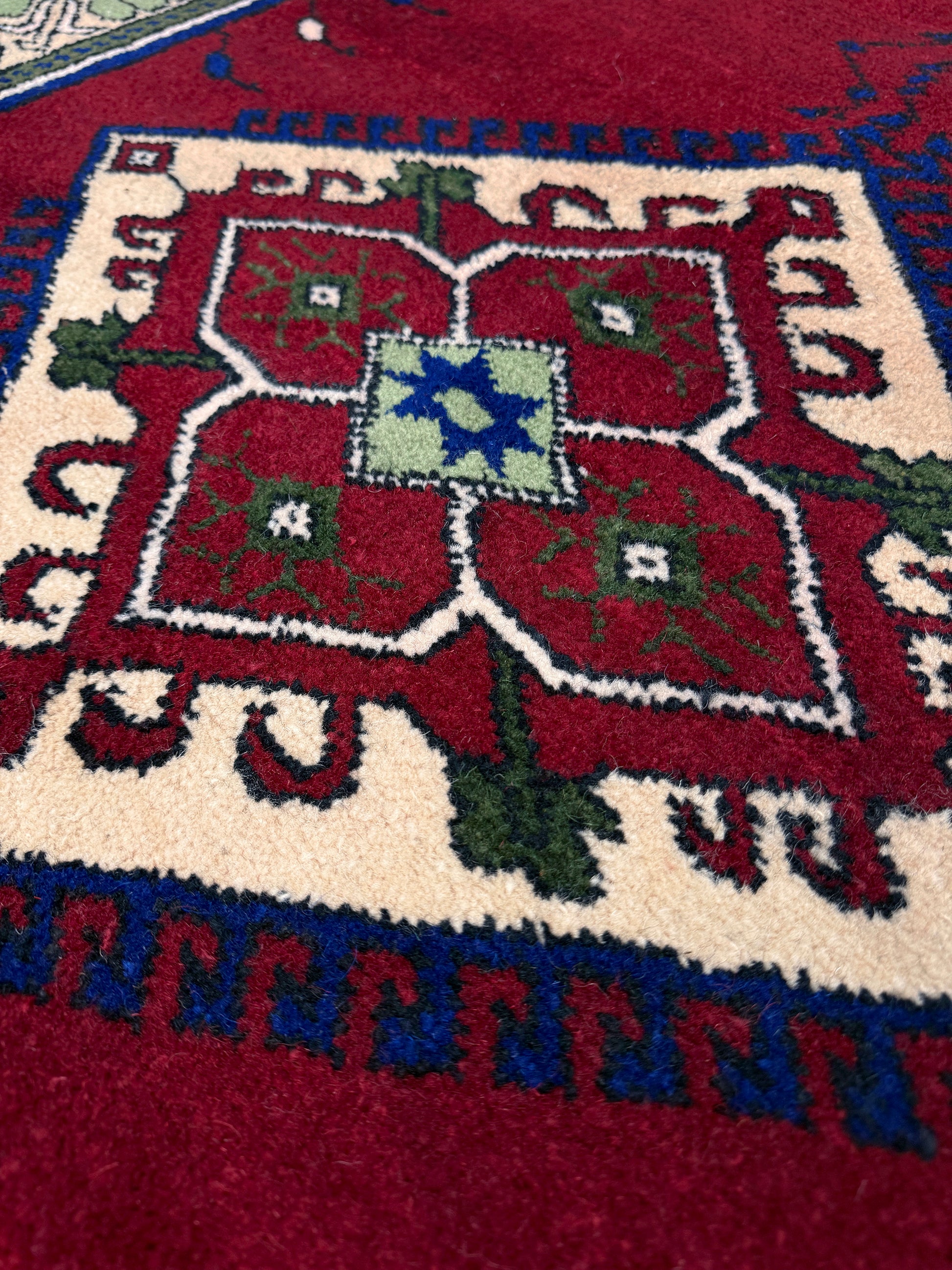 crimson red vibrant anatolian turkish vintage rug 5x7 traditional handmade village wool rug blue medallion floral border plush pile indigo rugs san francisco bay area