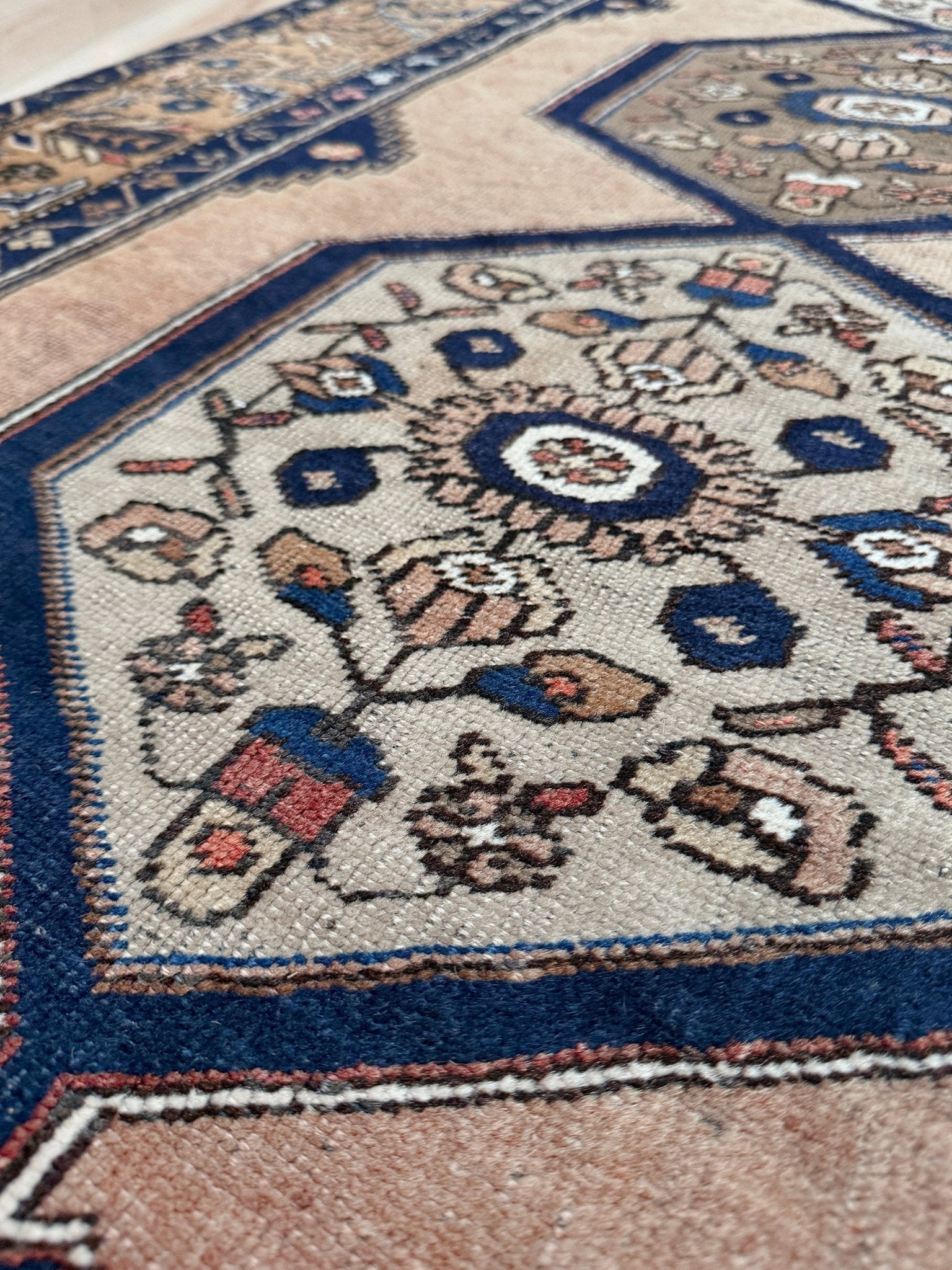 4x8 Vintage Yahyali Turkish wool rug with hexagonal medallions camel beige navy. Perfect for bedroom, living room, or kitchen. One-of-a-kind rug from Indigo Rugs in Burlingame, the best rug shop in the San Francisco Bay Area. Free shipping