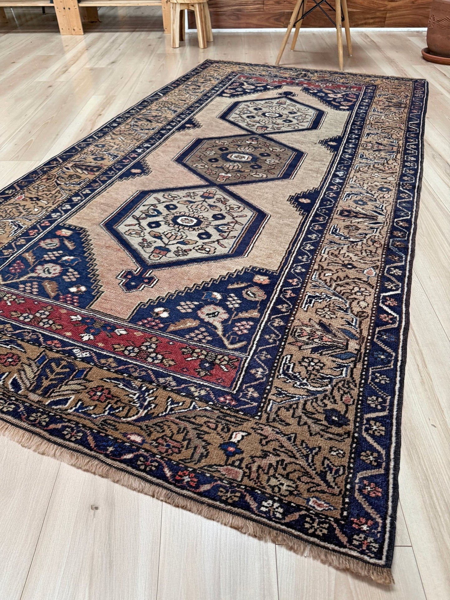 4x8 Vintage Yahyali Turkish wool rug with hexagonal medallions camel beige navy. Perfect for bedroom, living room, or kitchen. One-of-a-kind rug from Indigo Rugs in Burlingame, the best rug shop in the San Francisco Bay Area. Free shipping