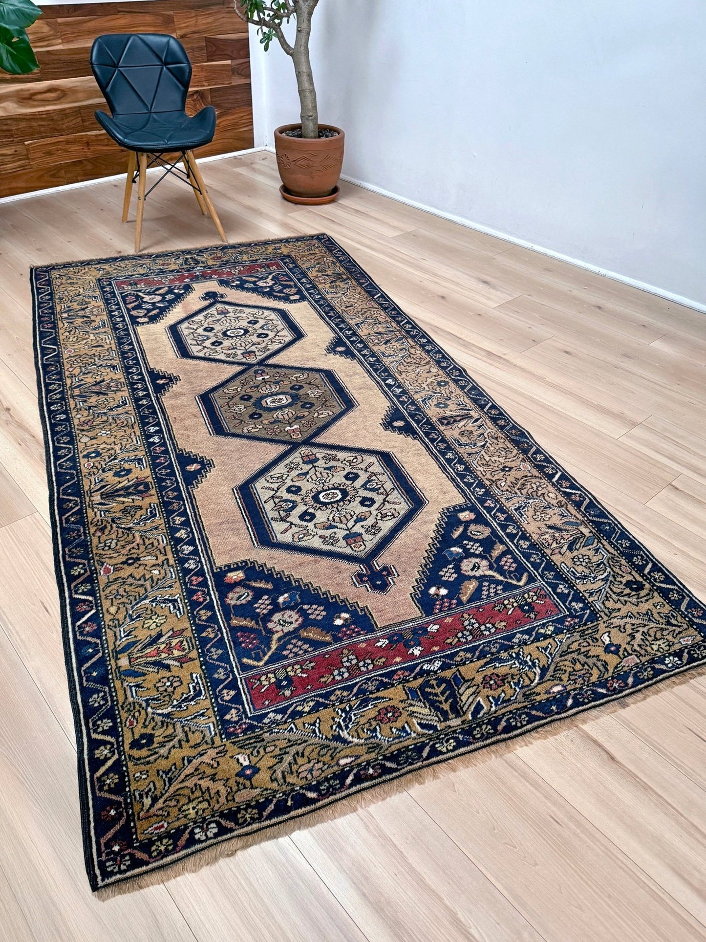 4x8 Vintage Yahyali Turkish wool rug with hexagonal medallions camel beige navy. Perfect for bedroom, living room, or kitchen. One-of-a-kind rug from Indigo Rugs in Burlingame, the best rug shop in the San Francisco Bay Area. Free shipping