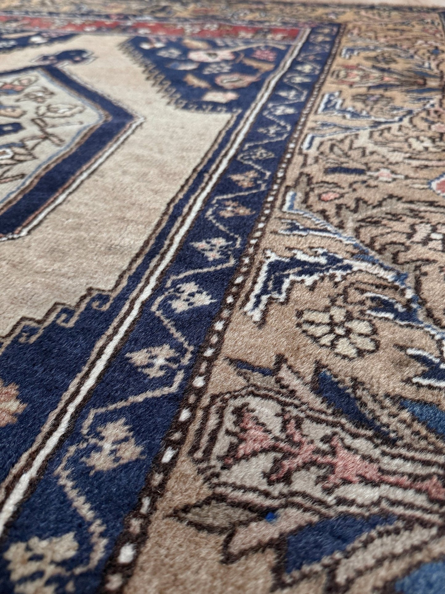 4x8 Vintage Yahyali Turkish wool rug with hexagonal medallions camel beige navy. Perfect for bedroom, living room, or kitchen. One-of-a-kind rug from Indigo Rugs in Burlingame, the best rug shop in the San Francisco Bay Area. Free shipping